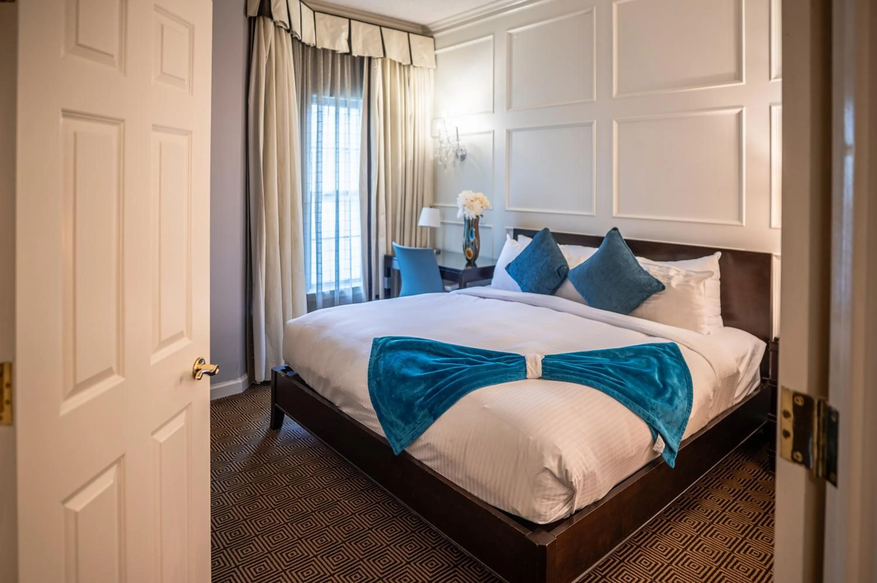 Bed in The Inn At Fox Hollow Hotel