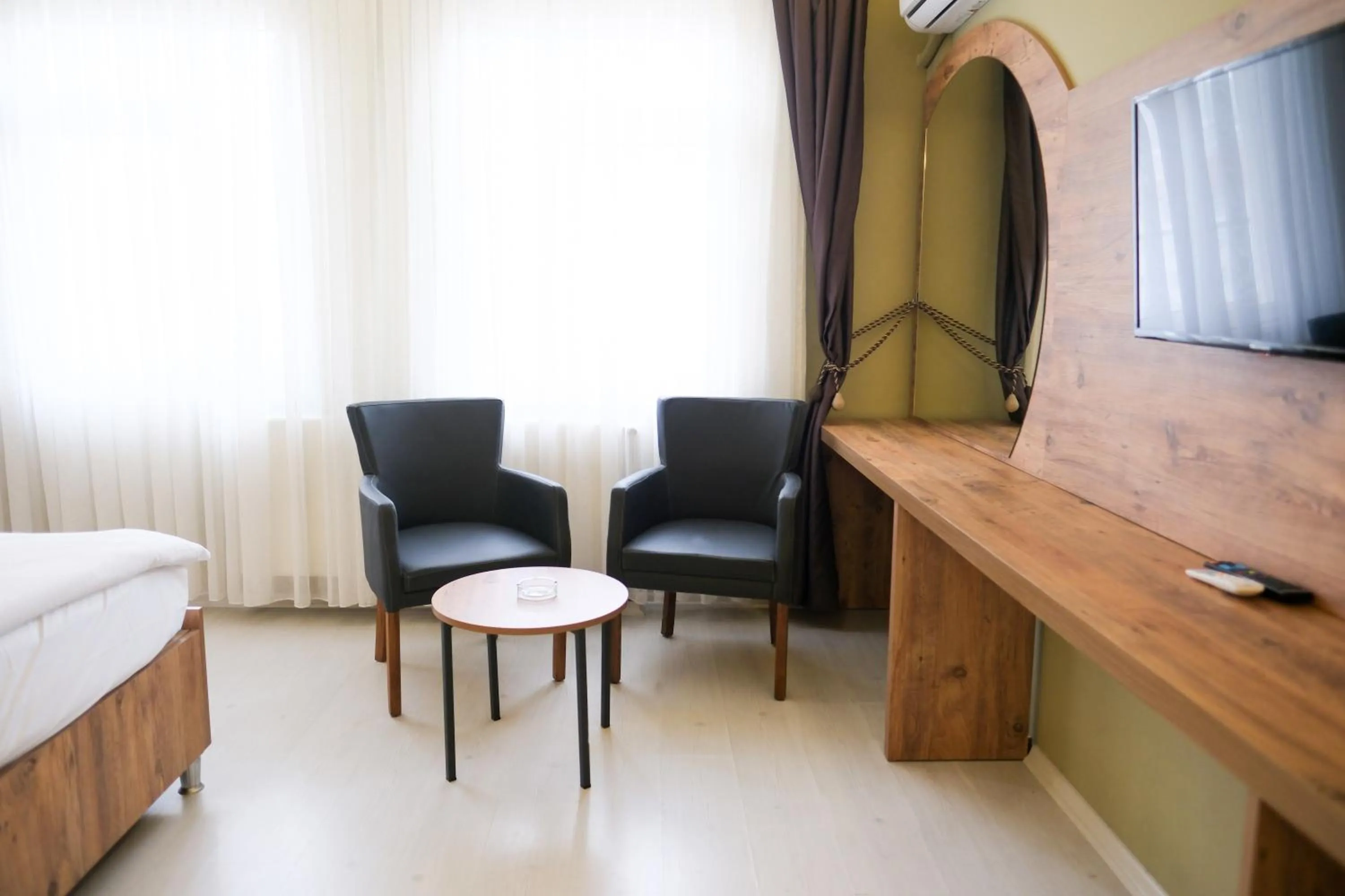 Seating area, Bed in Altayhan Otel