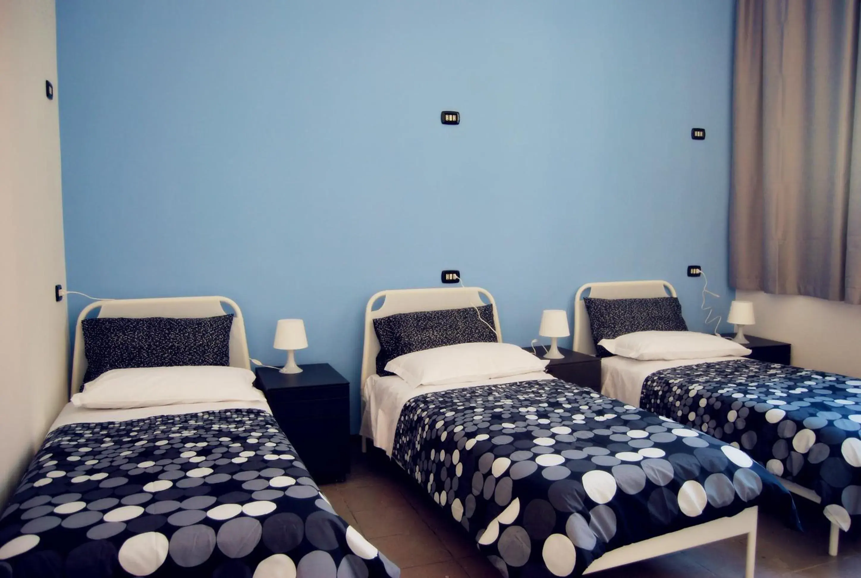 Triple Room with Shared Bathroom in Mio Hostel Triple Room with Shared Bathroom in Mio Hostel