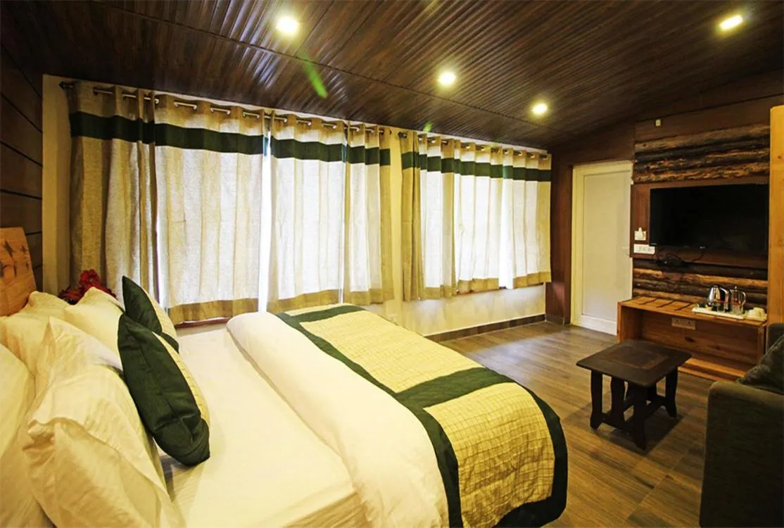 Photo of the whole room, Bed in Jharipani Castle