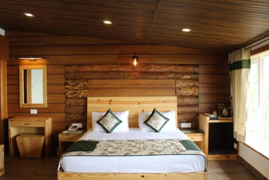 Photo of the whole room, Bed in Jharipani Castle