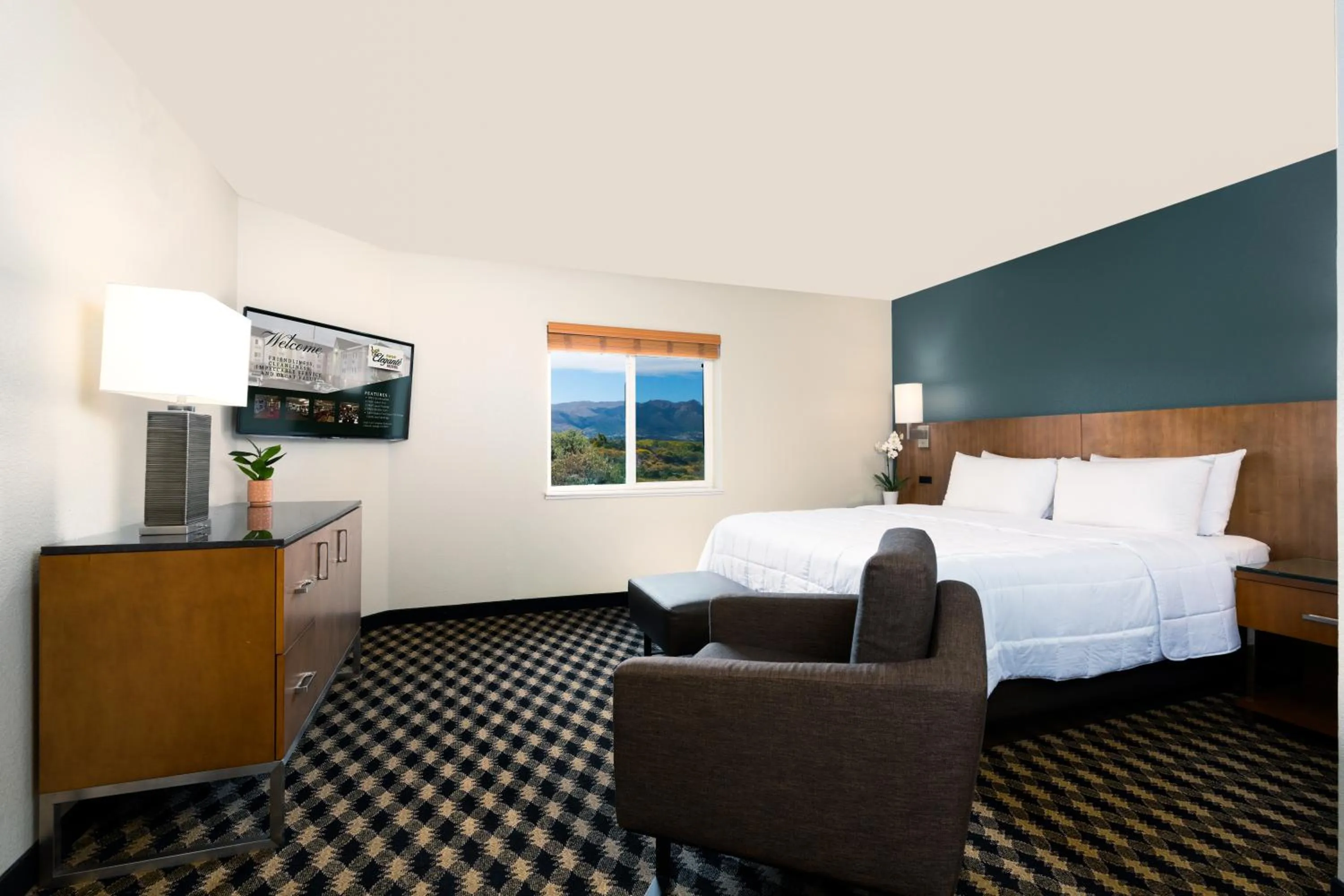 Bed in MCM Elegante Suites