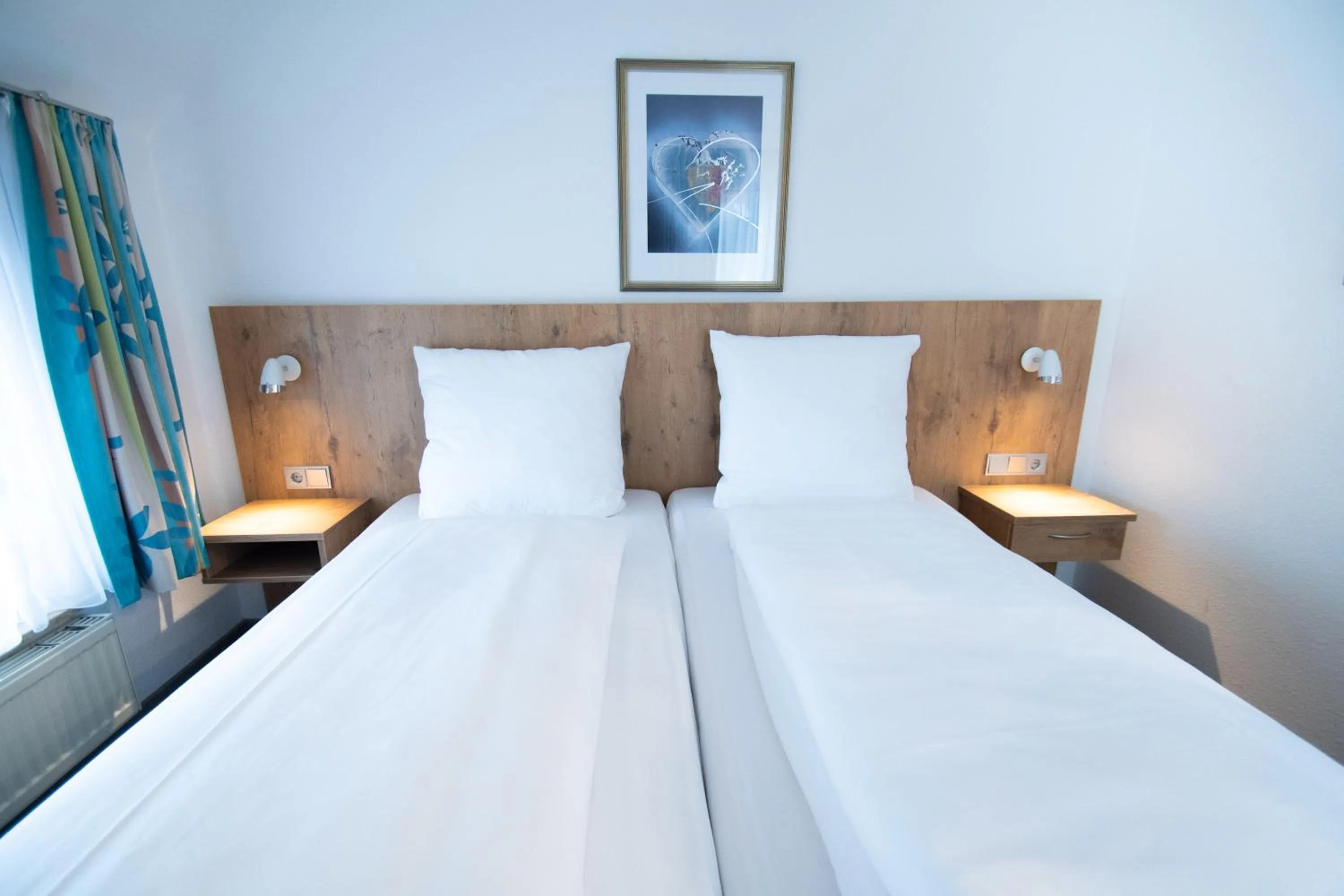 Bed in Taste Smart Hotel Backnang