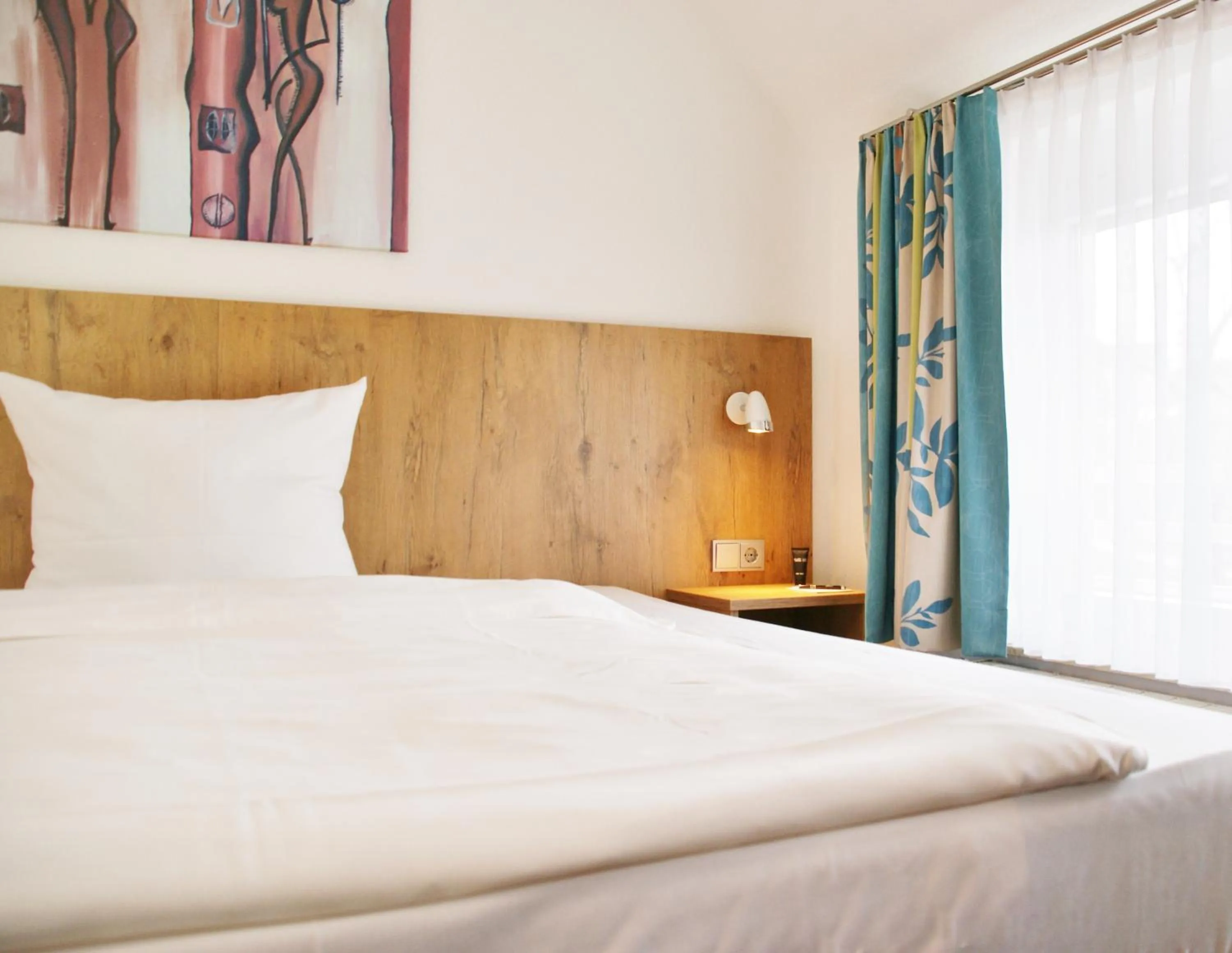 Photo of the whole room, Bed in Taste Smart Hotel Backnang