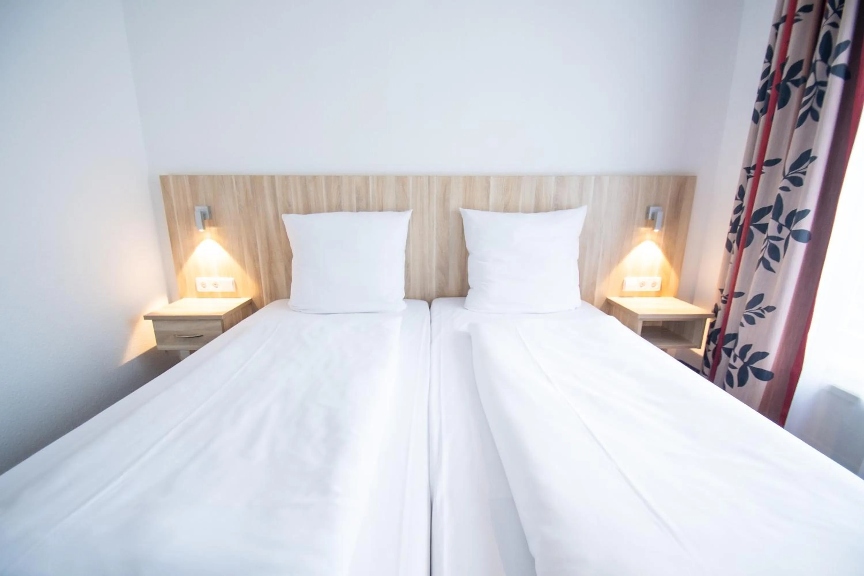 Photo of the whole room, Bed in Taste Smart Hotel Backnang