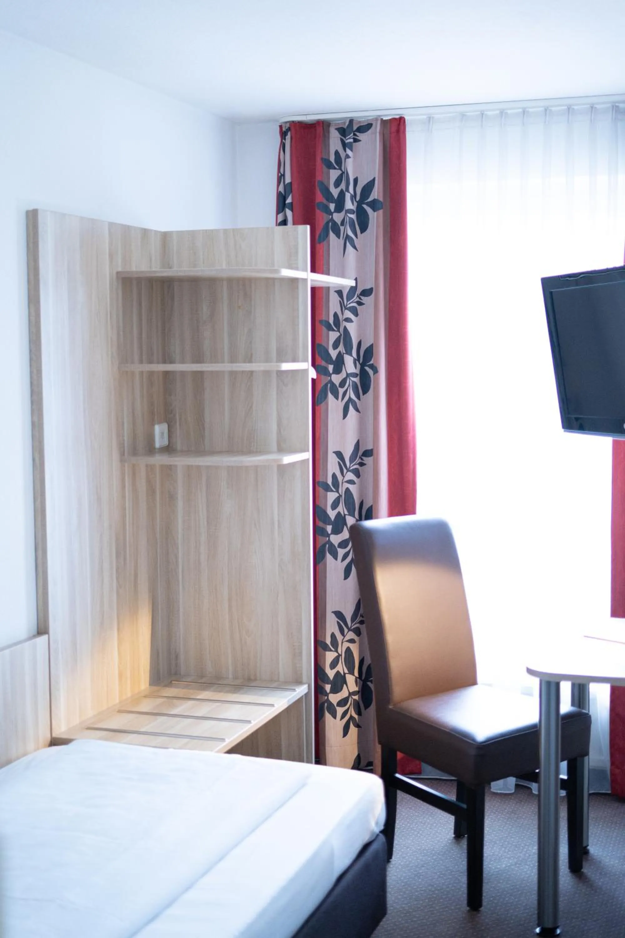 Photo of the whole room, Bed in Taste Smart Hotel Backnang