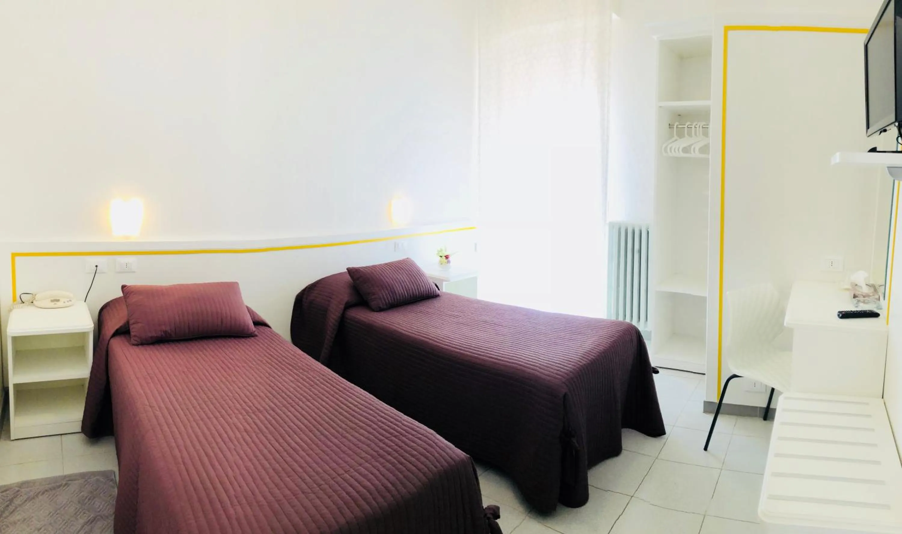 Bed in Albergo Ester