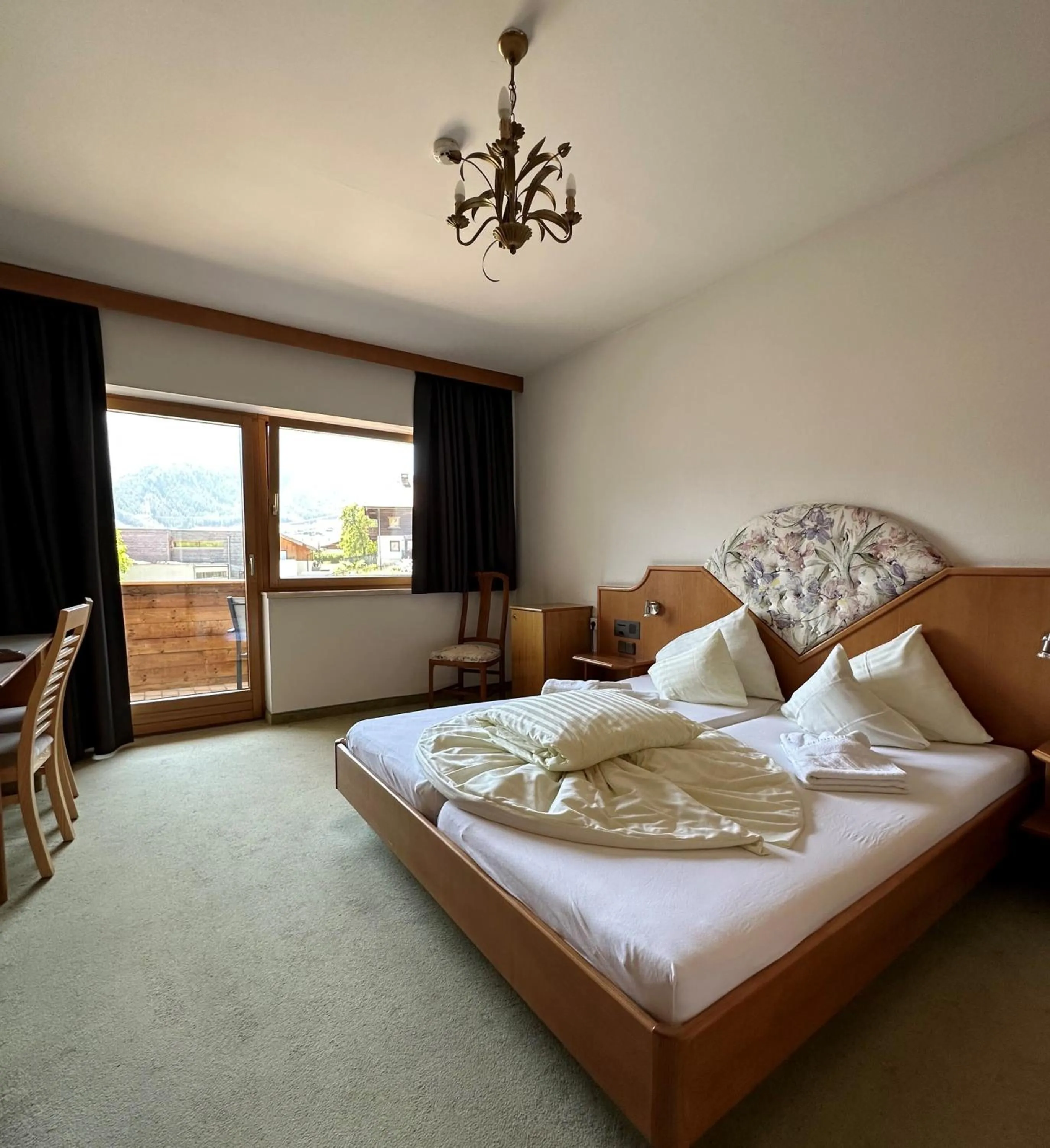 Photo of the whole room, Bed in Hotel Alpina nature-wellness