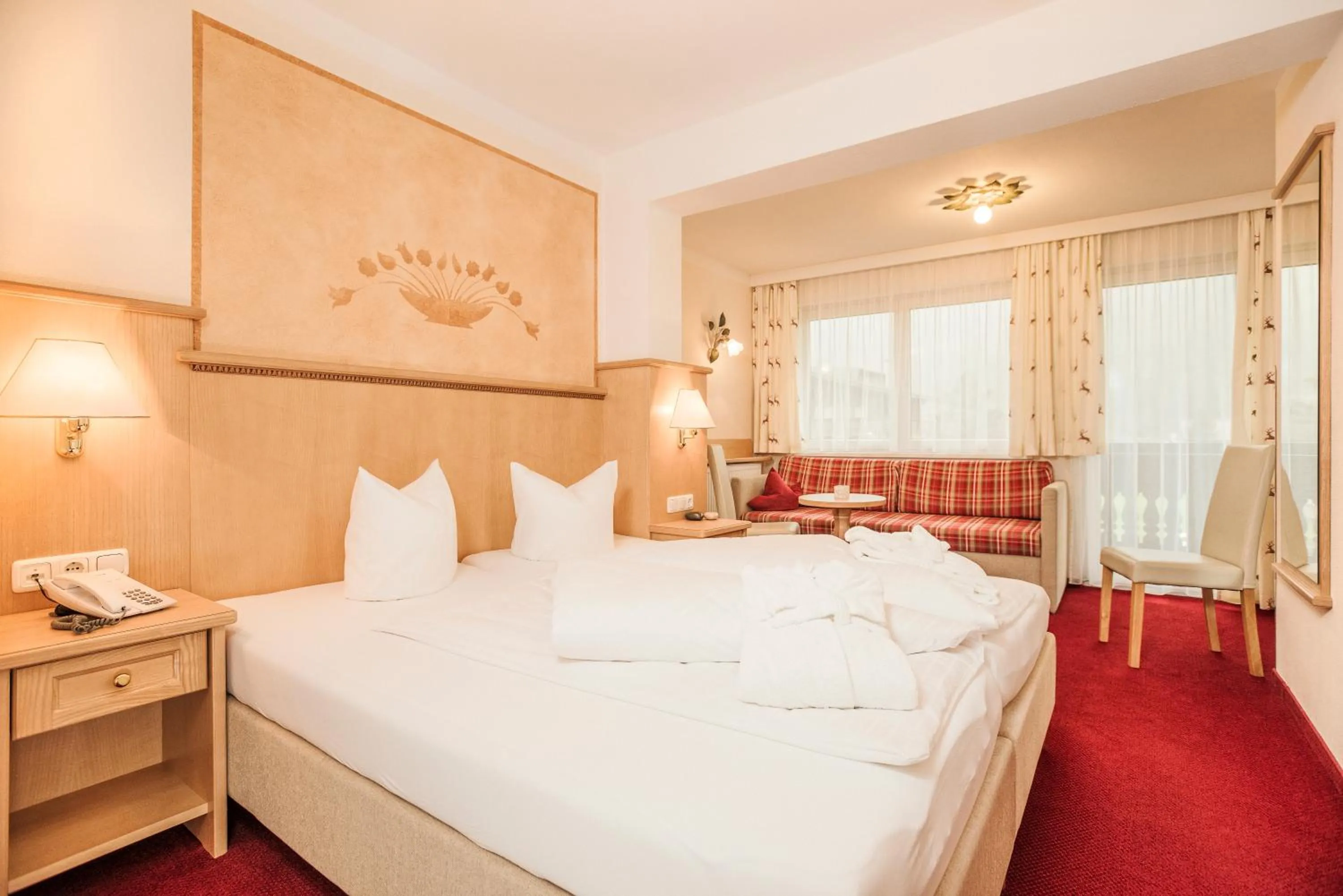 Photo of the whole room, Bed in Hotel Alpenhof Kristall