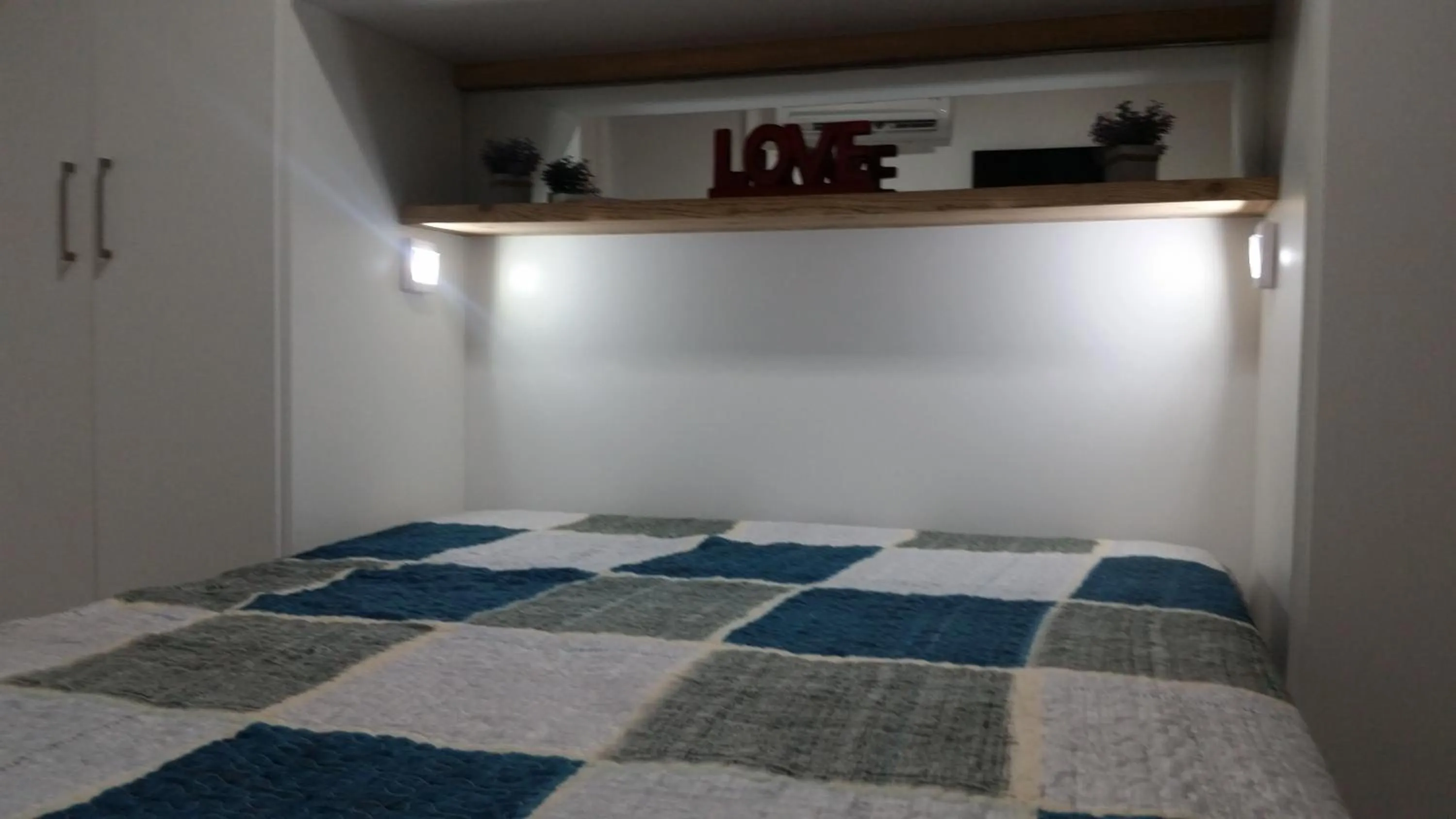 Bed in Mandakaru Residence Flats