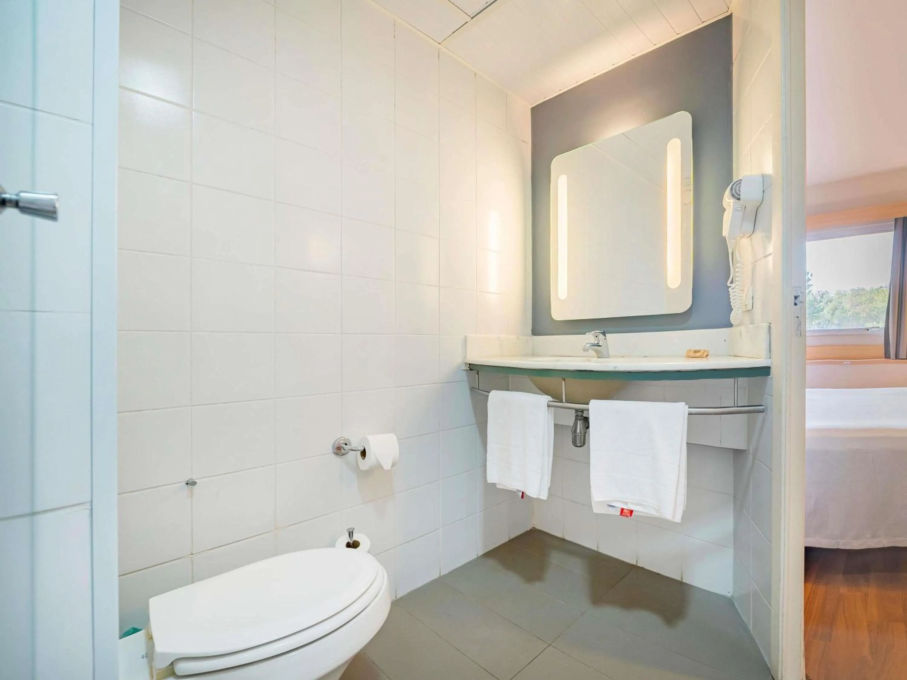 Bedroom in ibis Piracicaba