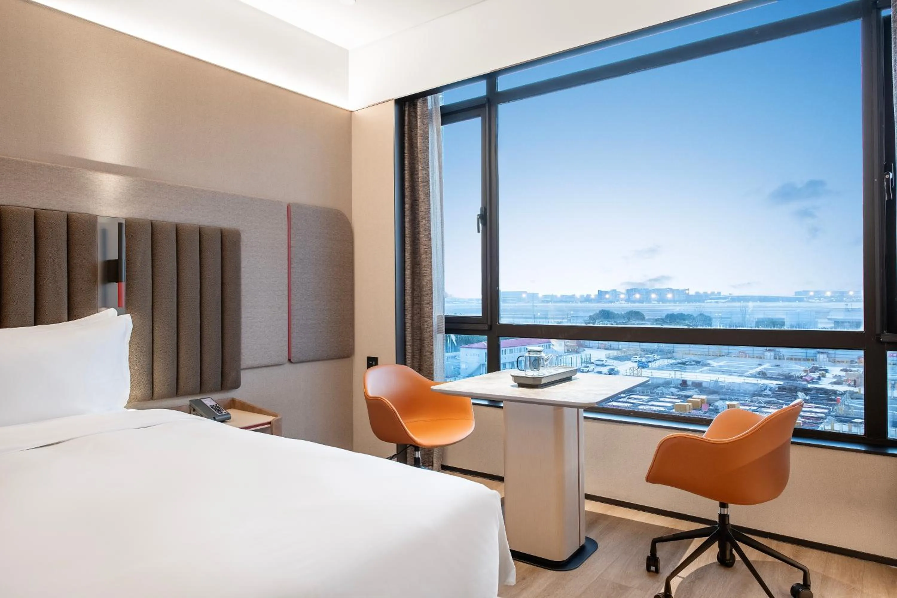 Seating area, Bed in IntercityHotel Shanghai Hongqiao Airport - Free Minibar for First Night