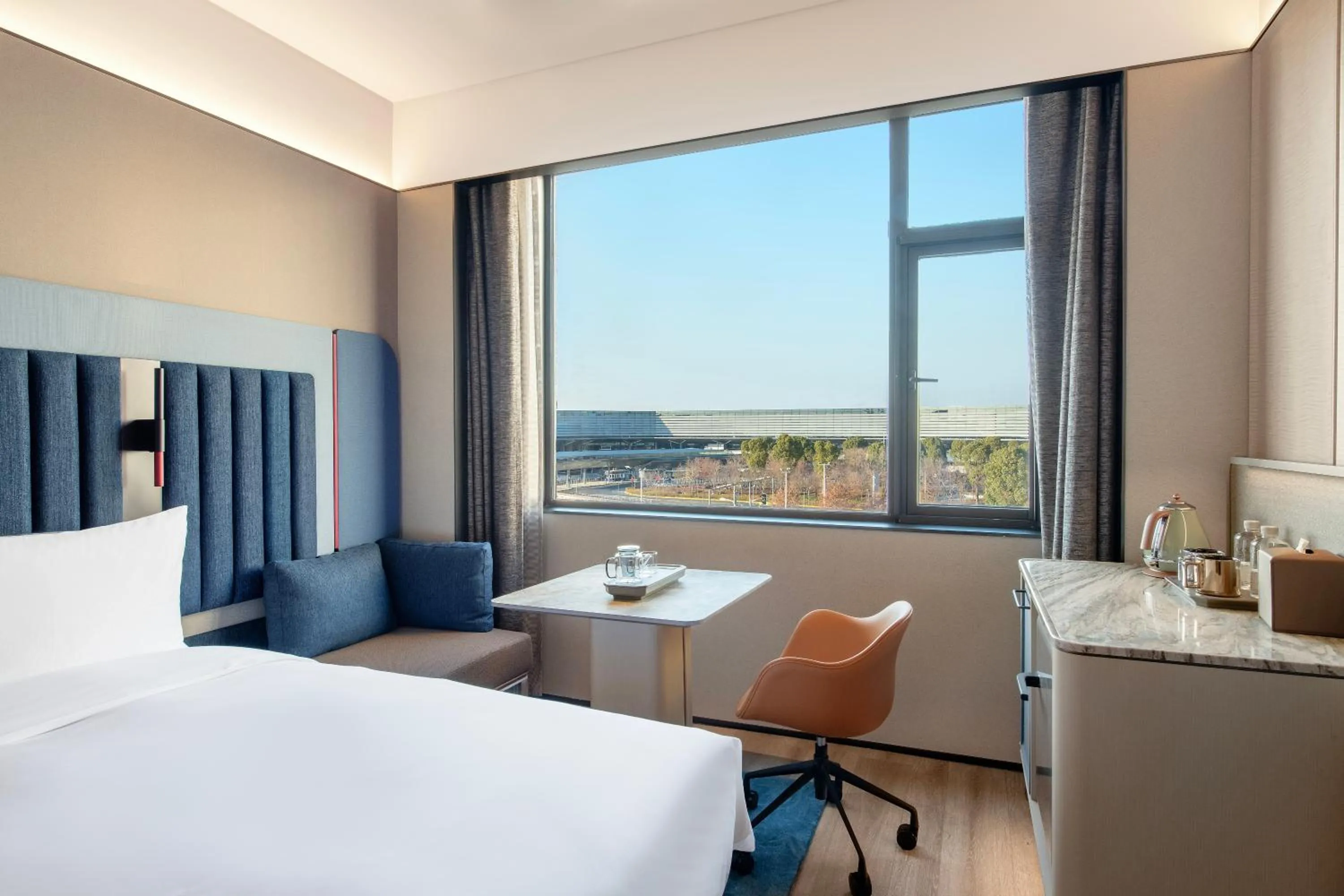 Seating area, Bed in IntercityHotel Shanghai Hongqiao Airport - Free Minibar for First Night