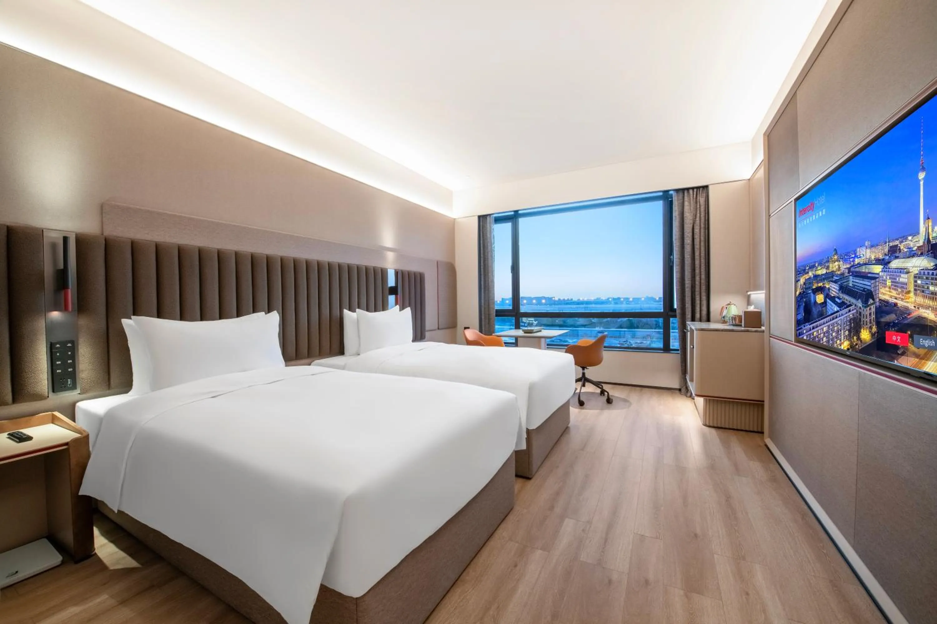 Photo of the whole room, Bed in IntercityHotel Shanghai Hongqiao Airport - Free Minibar for First Night