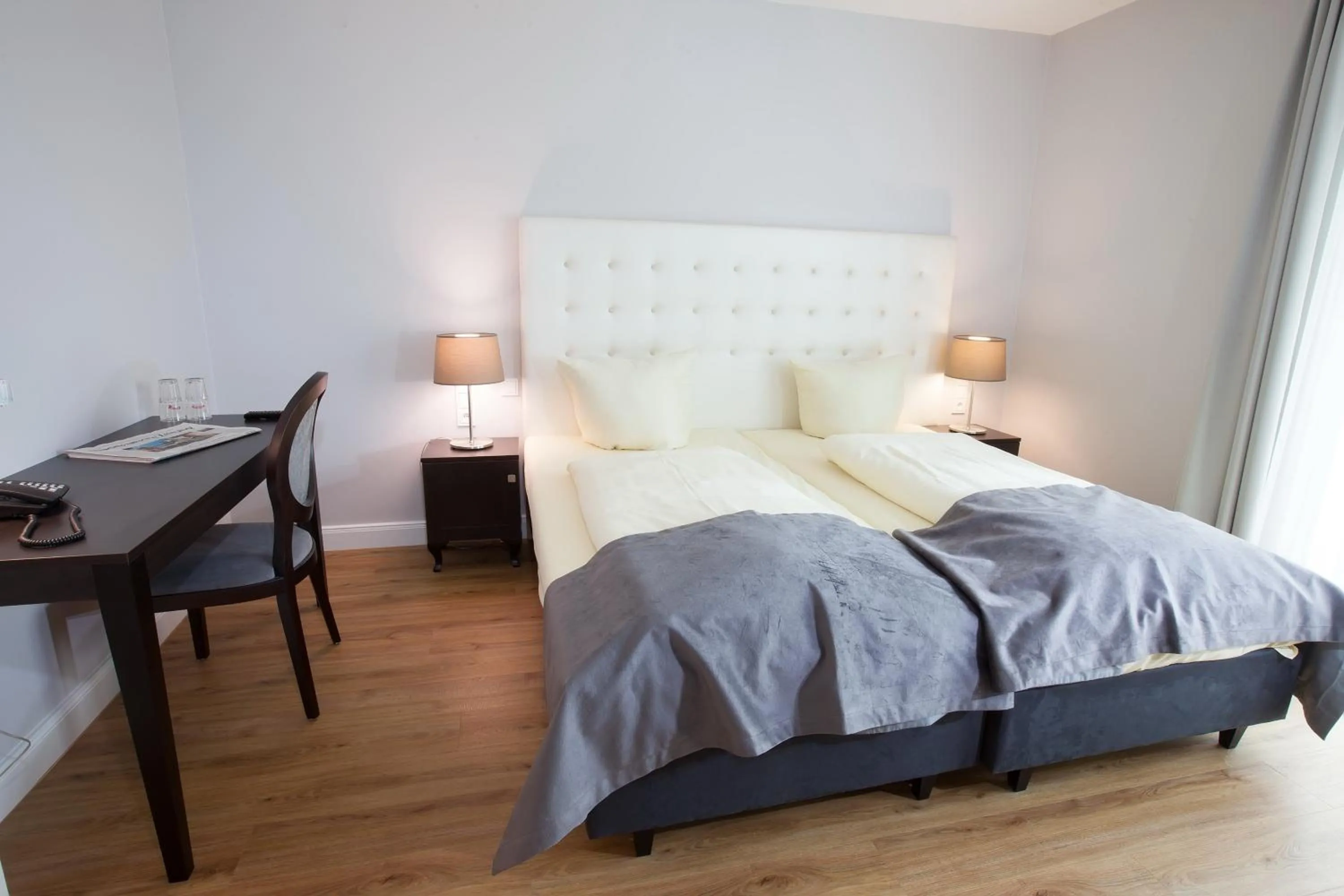 Photo of the whole room, Bed in Hotel Rheinischer Hof Bad Soden