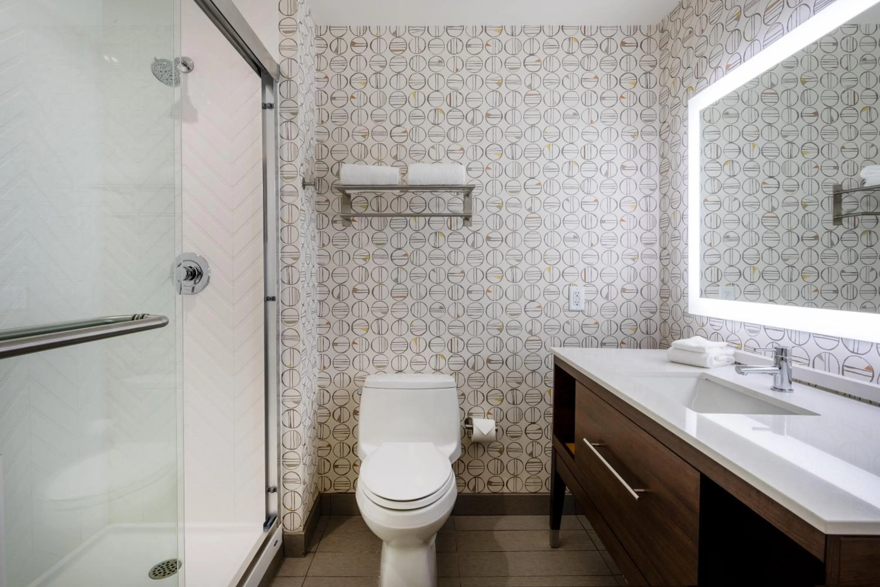 Bathroom in Holiday Inn - Long Island - ISLIP Arpt East by IHG