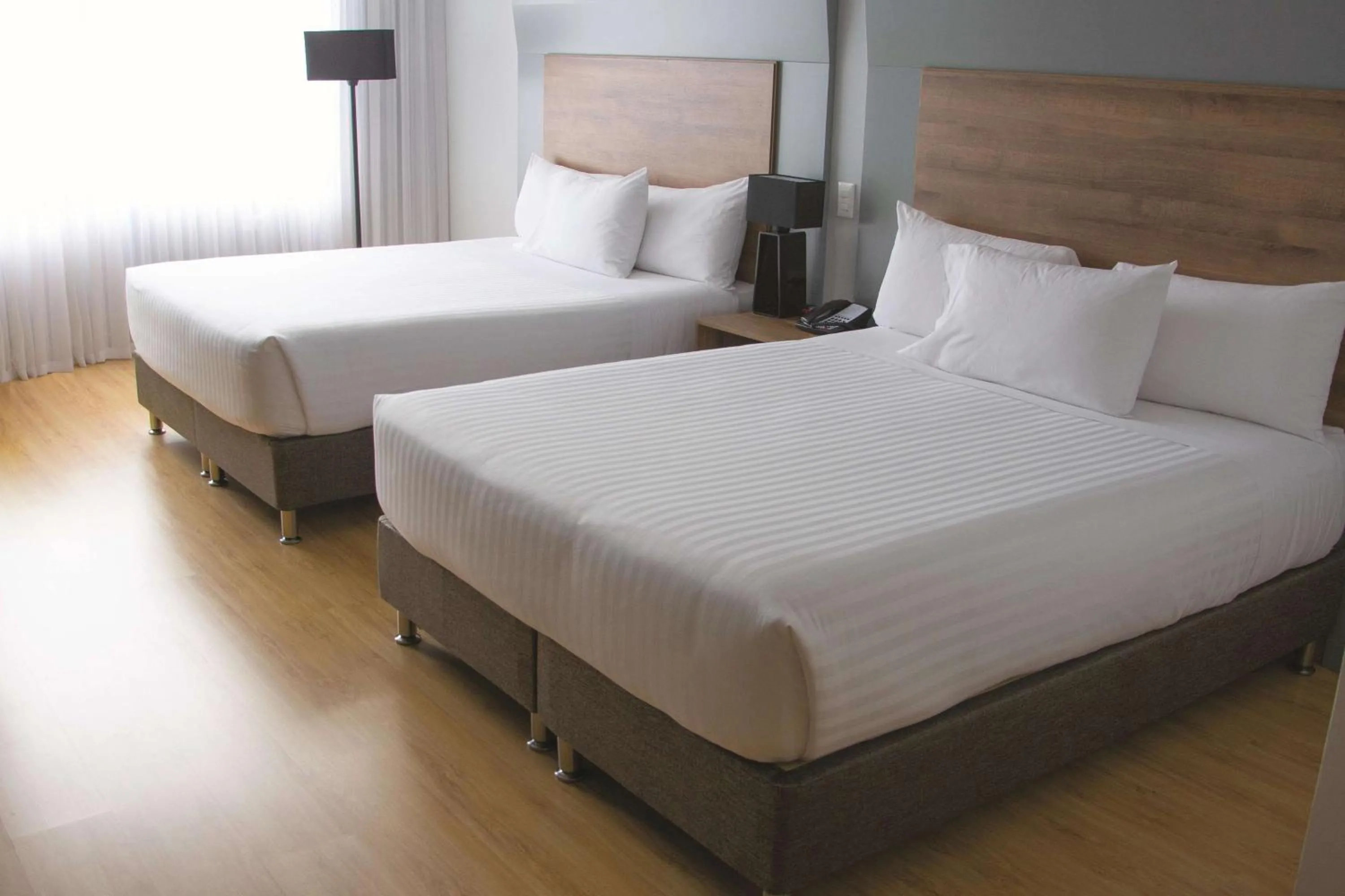 Photo of the whole room, Bed in La Quinta by Wyndham Medellin