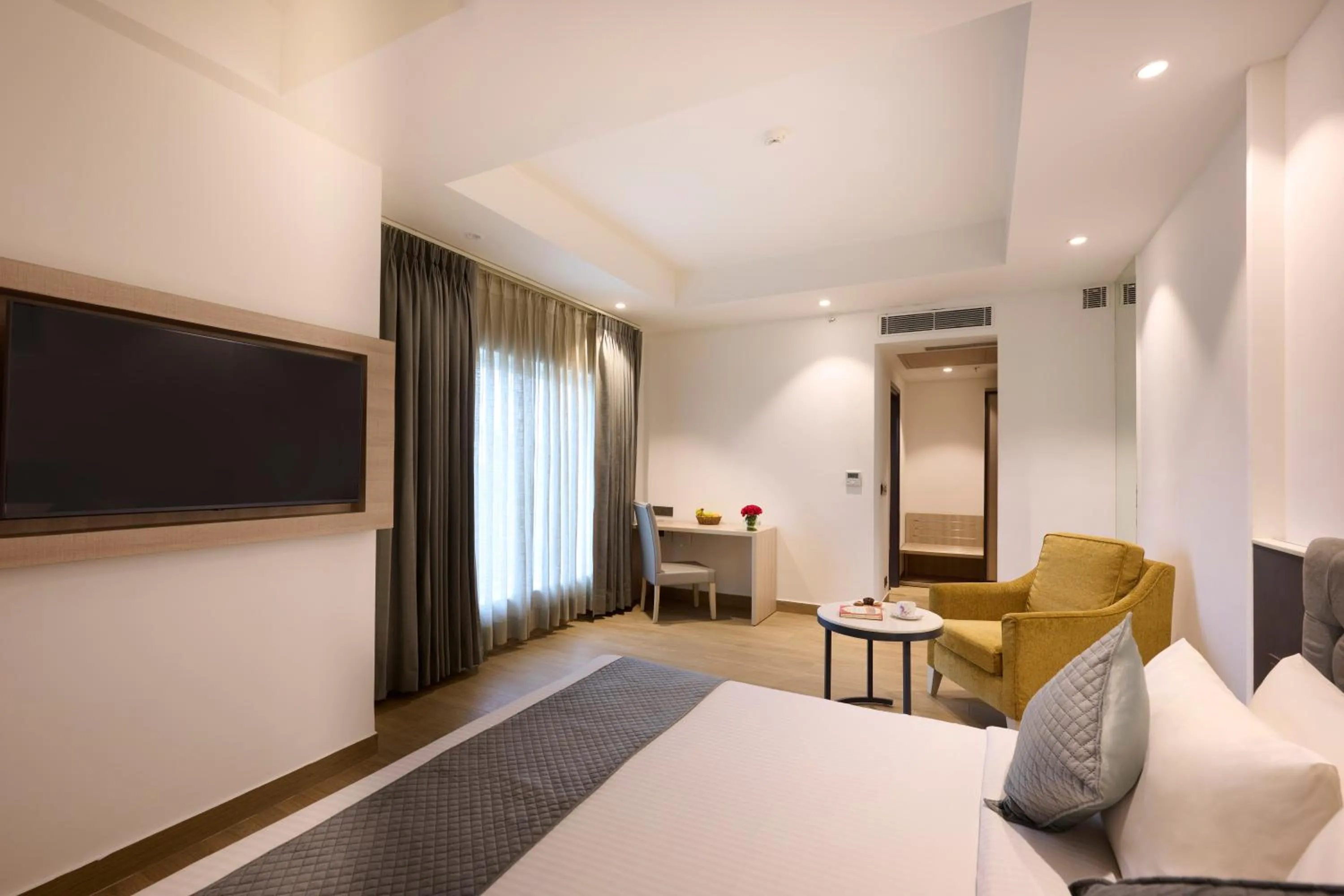 Bed in Delite Sarovar Portico Faridabad