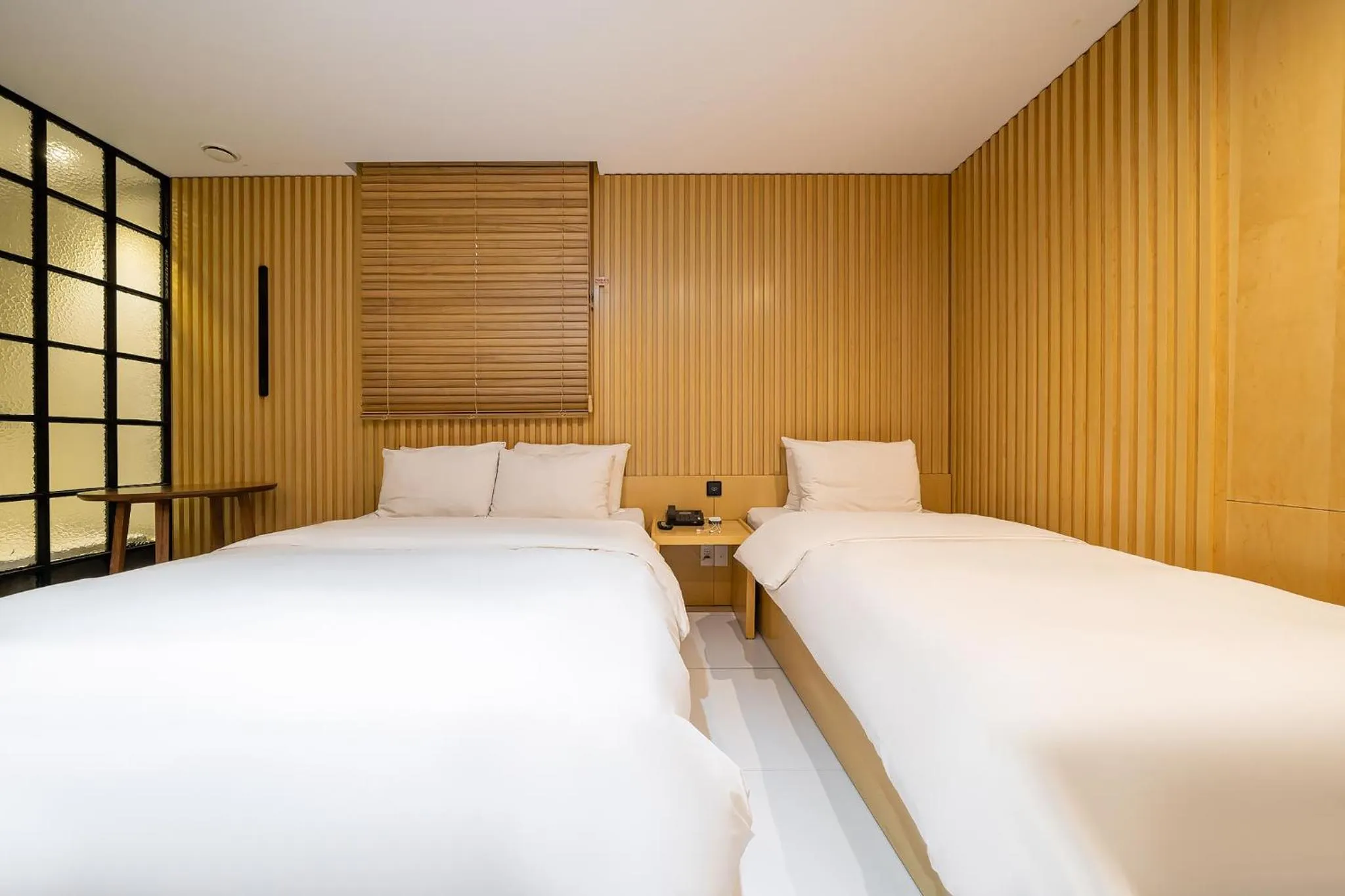 Bed in Hotel The Designers Kondae