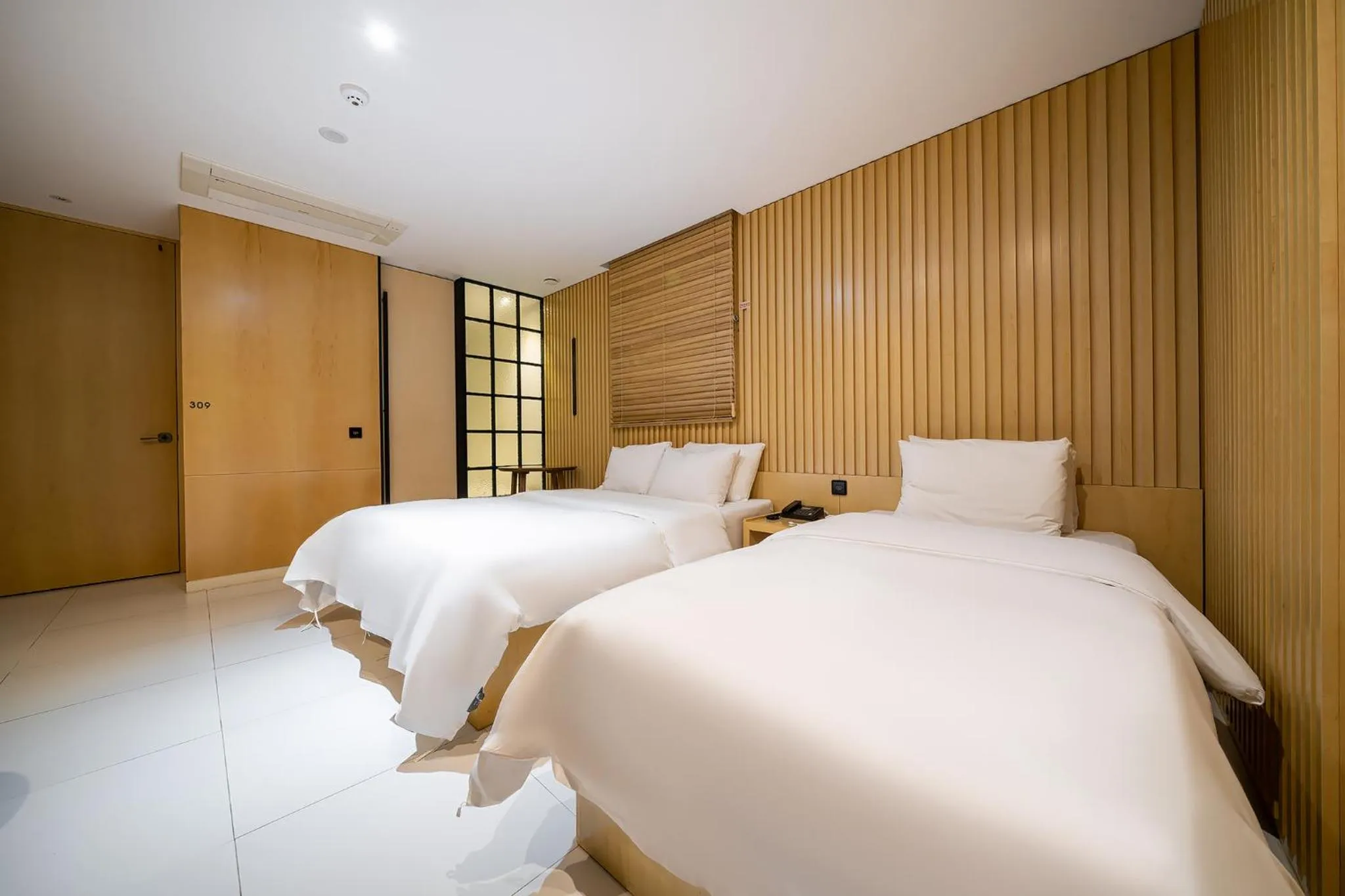 Bed in Hotel The Designers Kondae