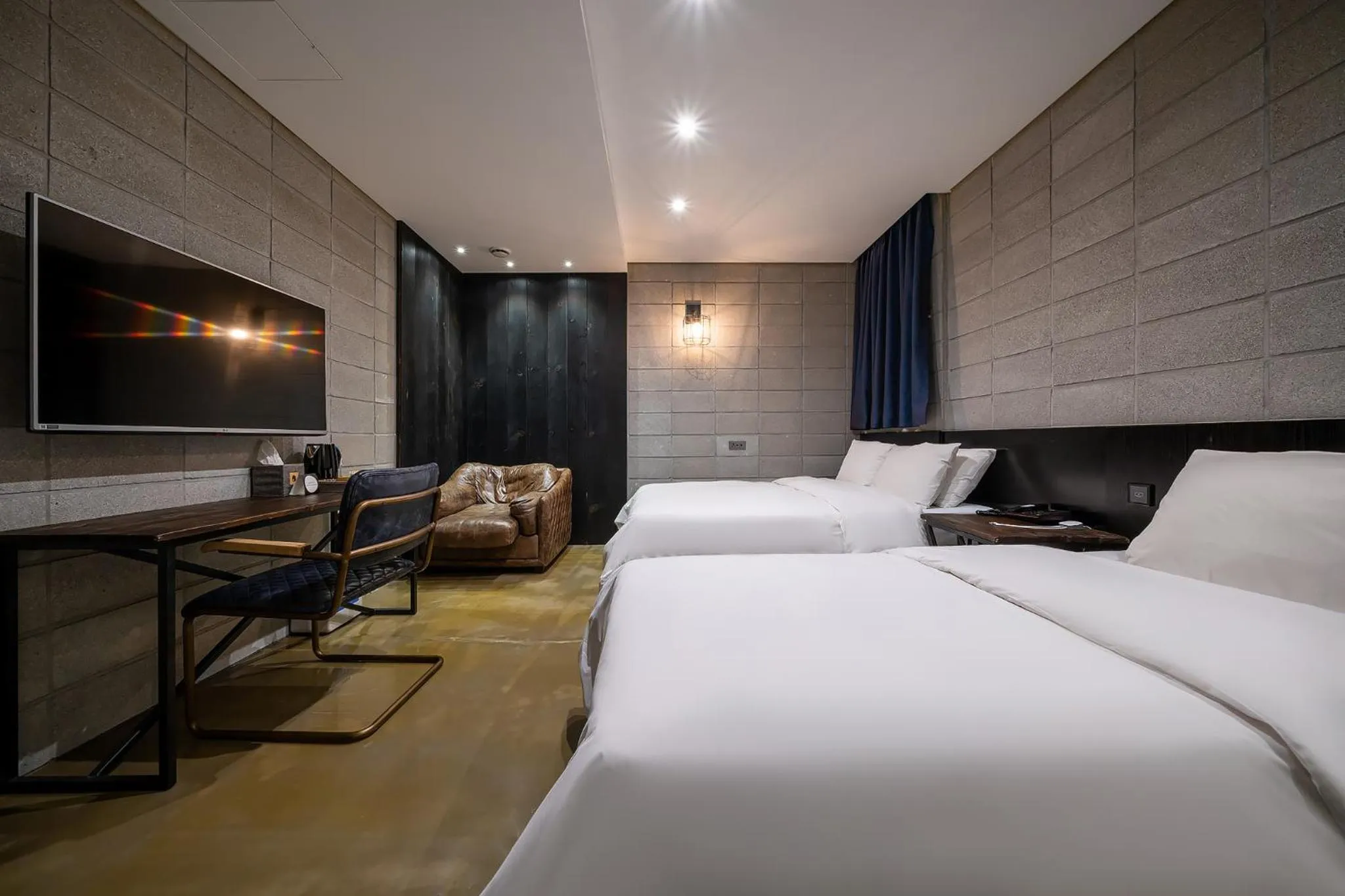 Bed in Hotel The Designers Kondae