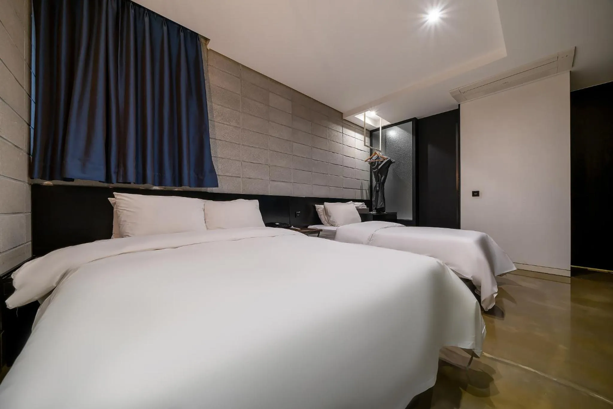 Bed in Hotel The Designers Kondae