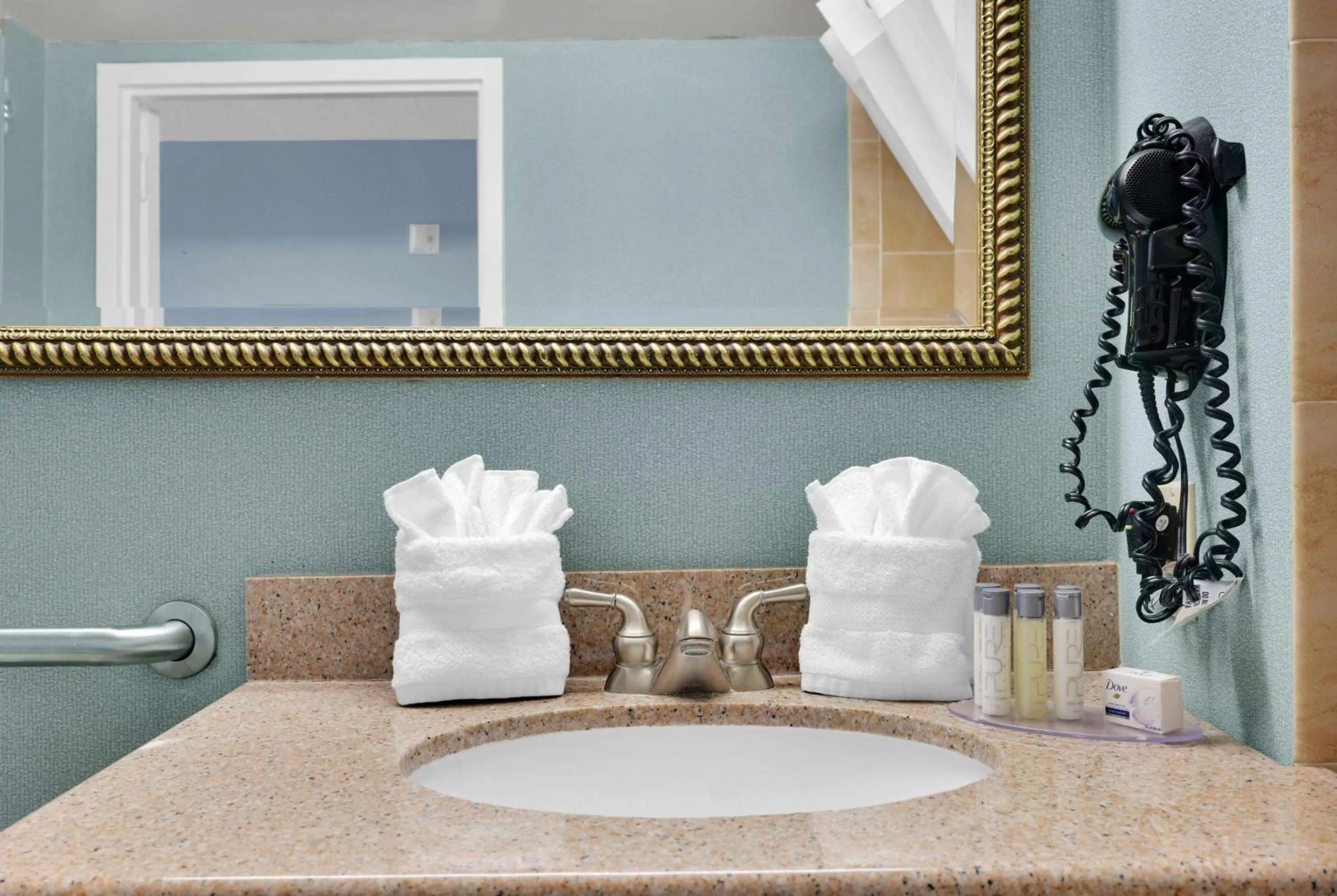 TV and multimedia in Ramada by Wyndham Jacksonville I-95 by Butler Blvd