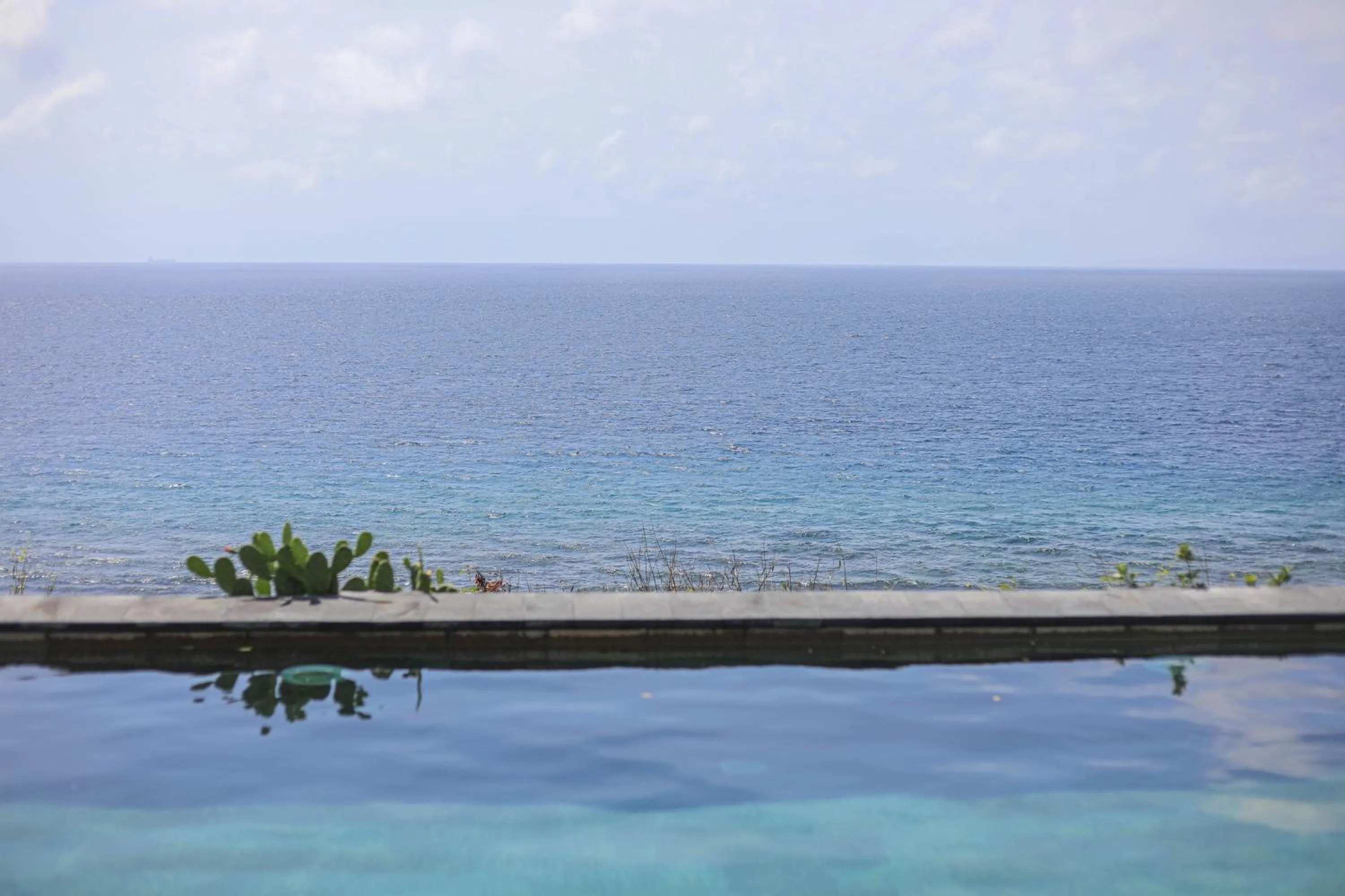 Pool view in Manta Cottages with Sea View