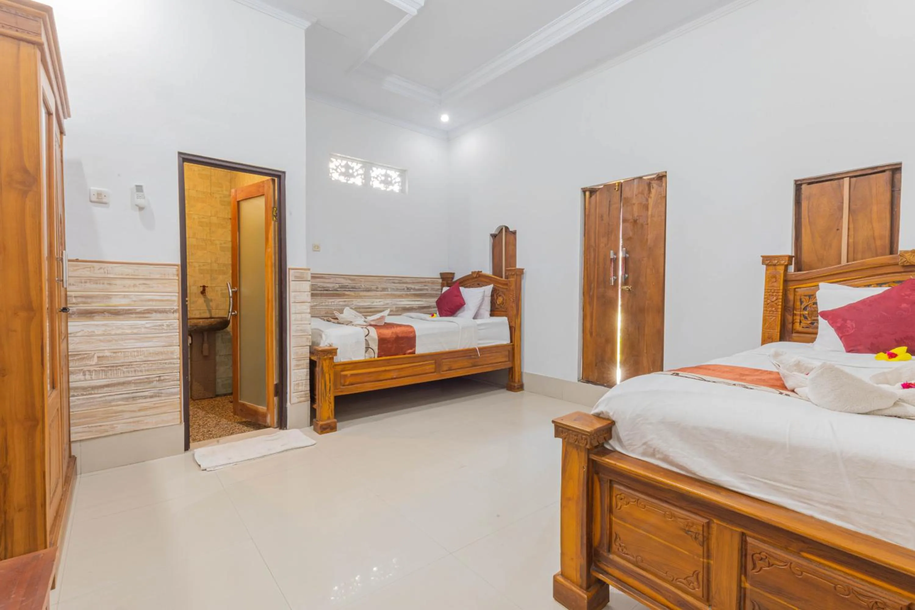 Bed in Manta Cottages with Sea View