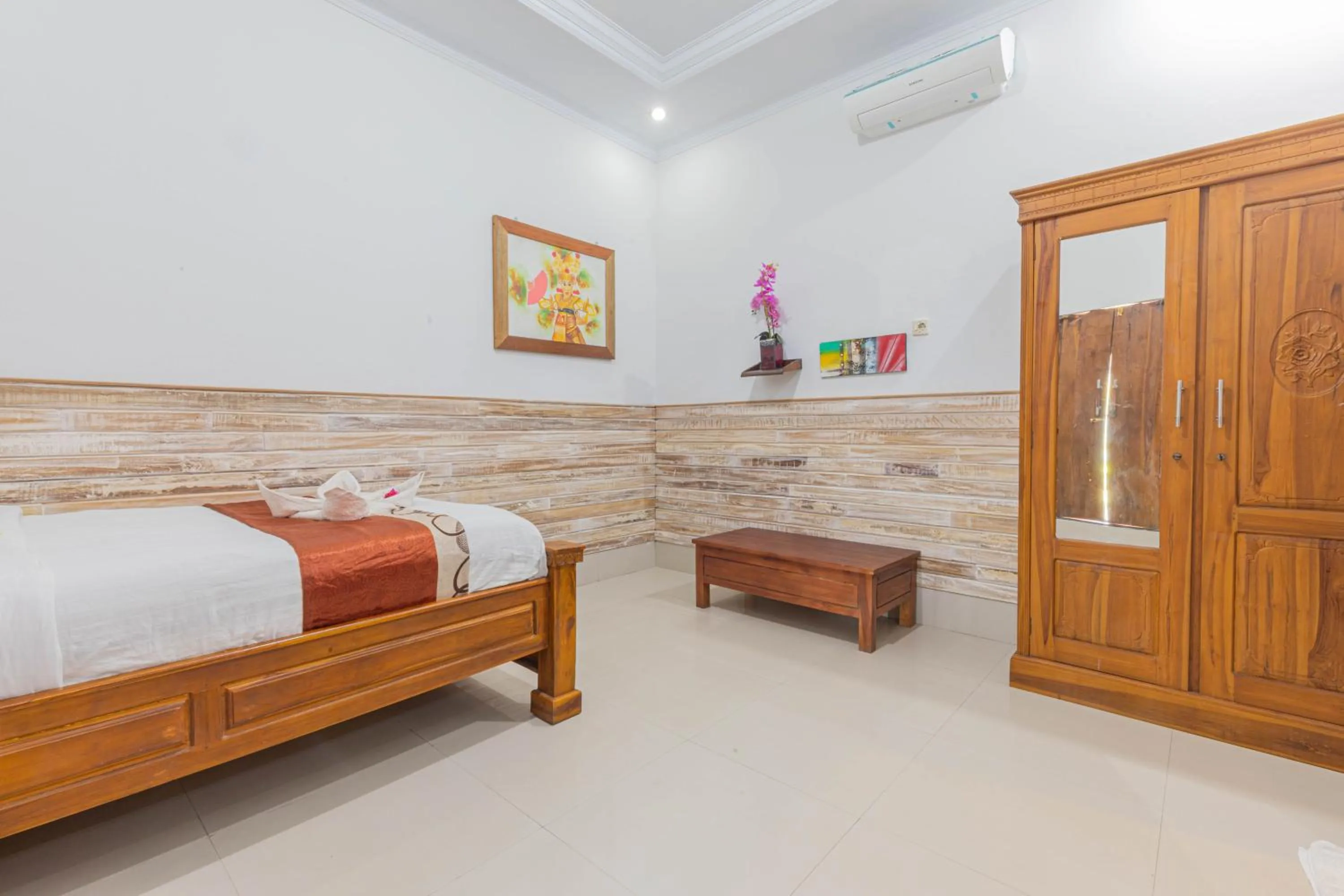 Bed in Manta Cottages with Sea View