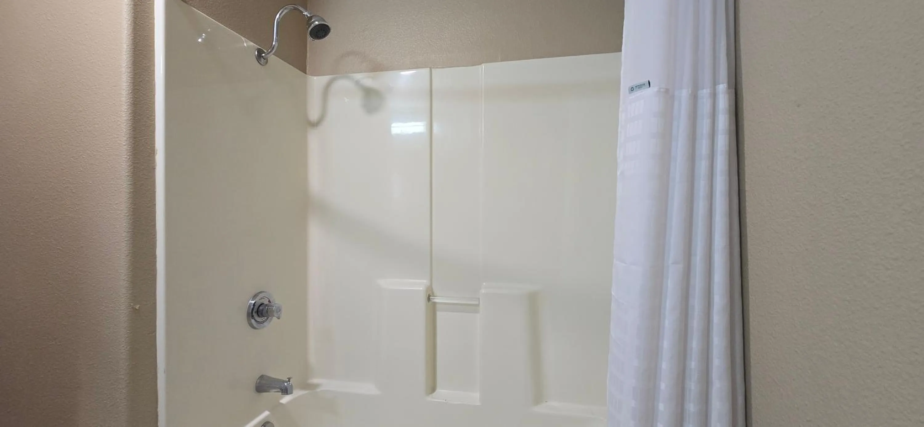 Bathroom in Super 8 by Wyndham New Braunfels I-35