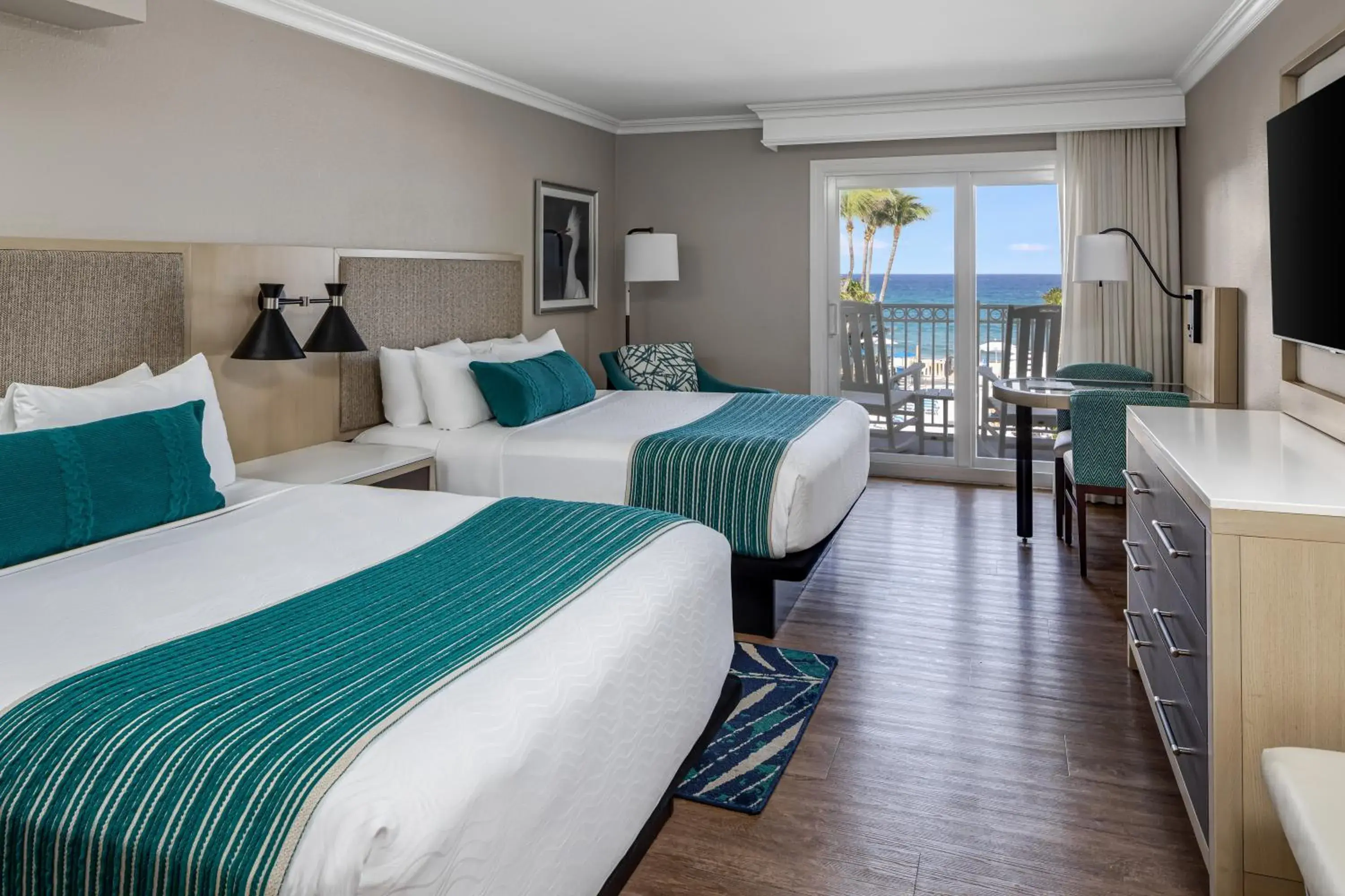 Queen Beds with Partial Ocean View in Delray Sands Resort Queen Beds with Partial Ocean View in Delray Sands Resort