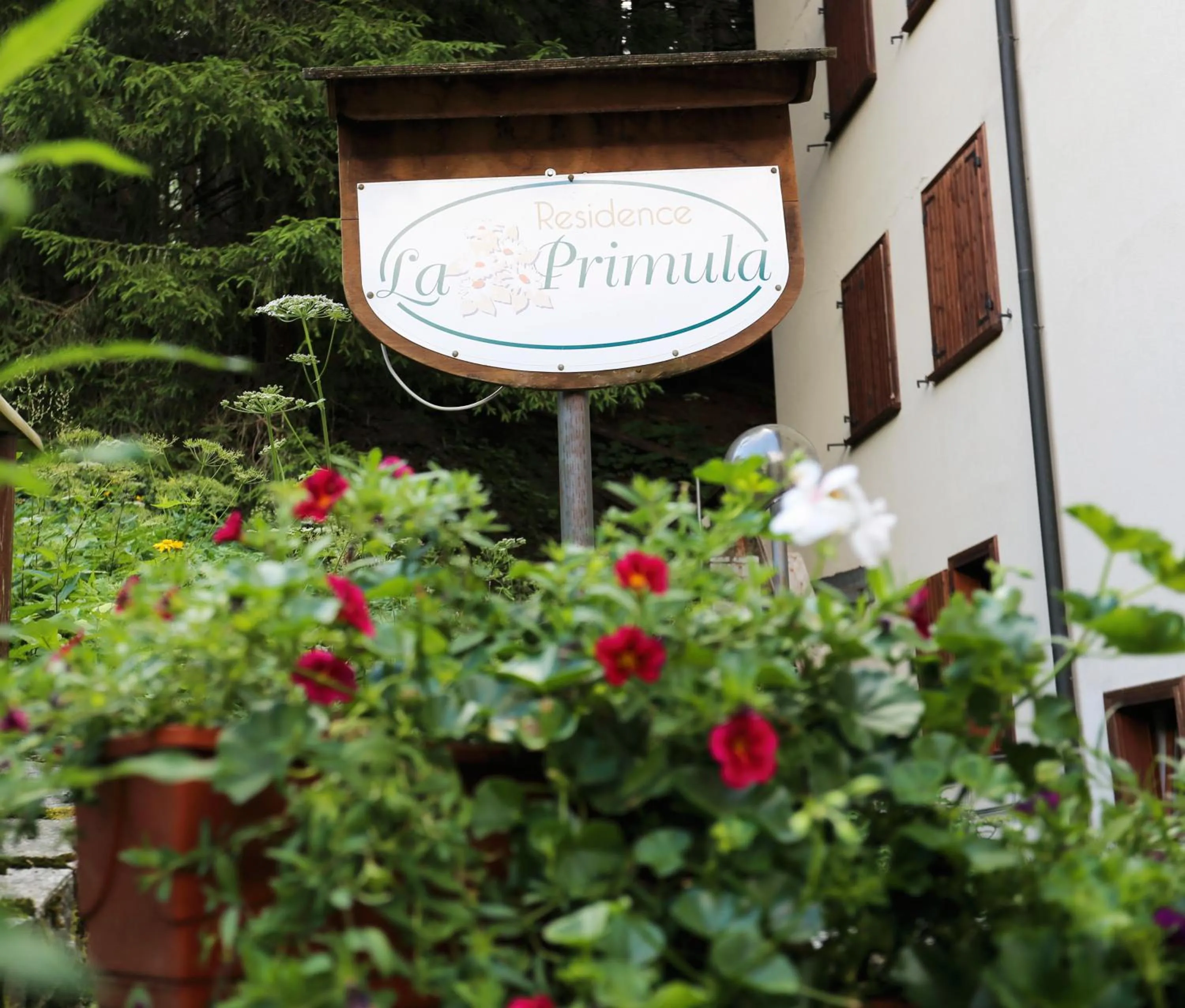 Property logo or sign in Residence Primula