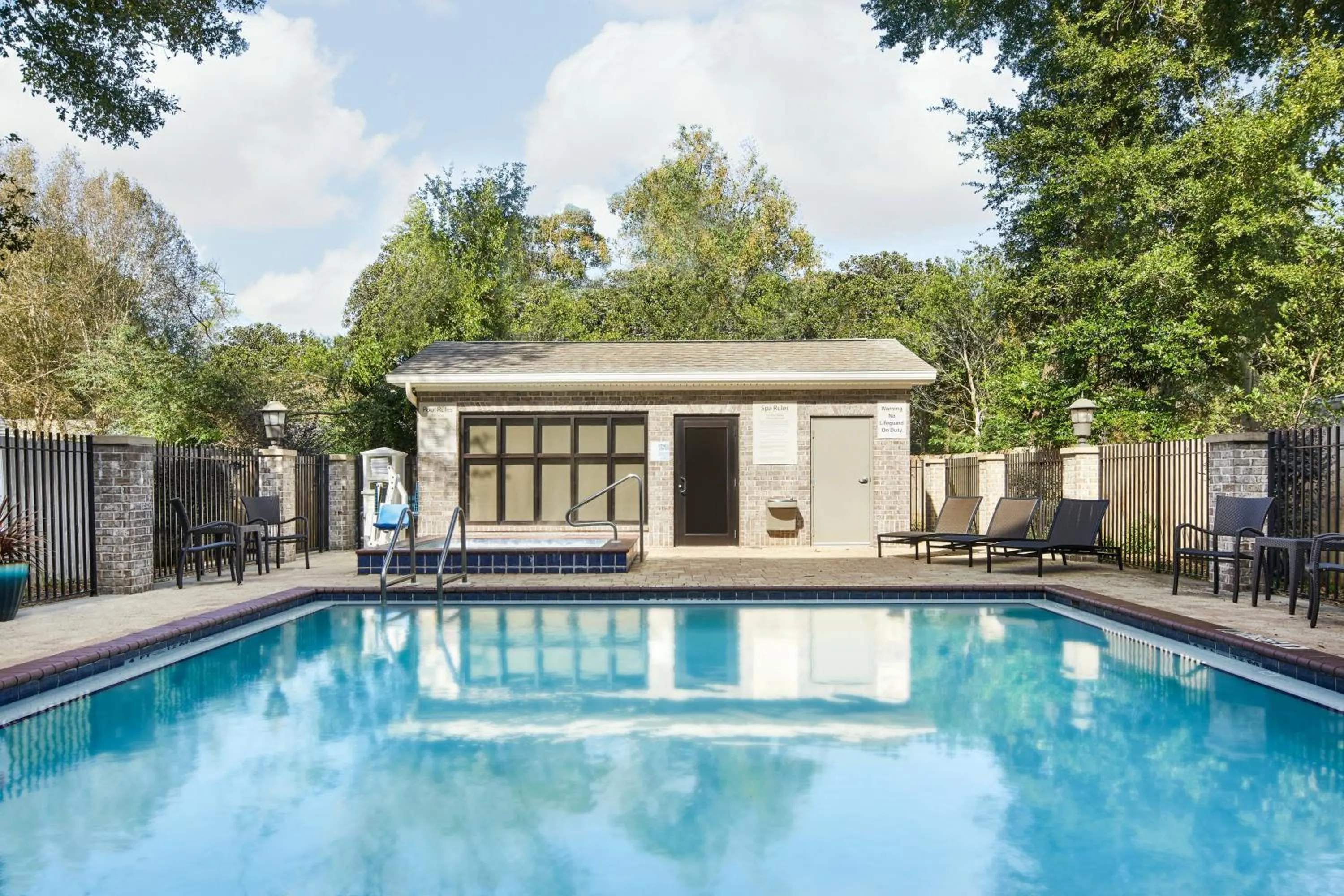 Swimming pool in Holiday Inn Express Hotel & Suites Pensacola-West Navy Base by IHG