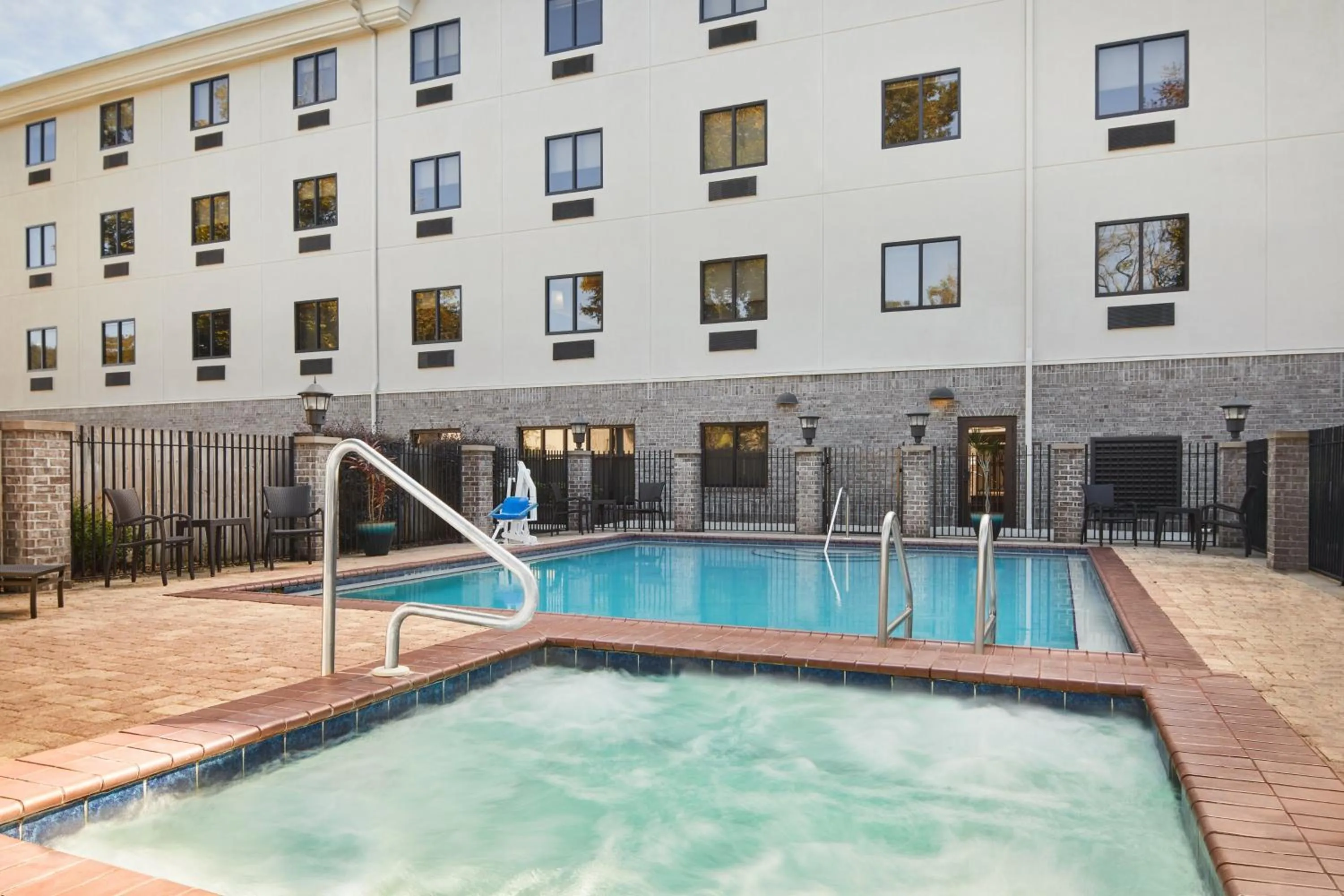 Swimming pool in Holiday Inn Express Hotel & Suites Pensacola-West Navy Base by IHG