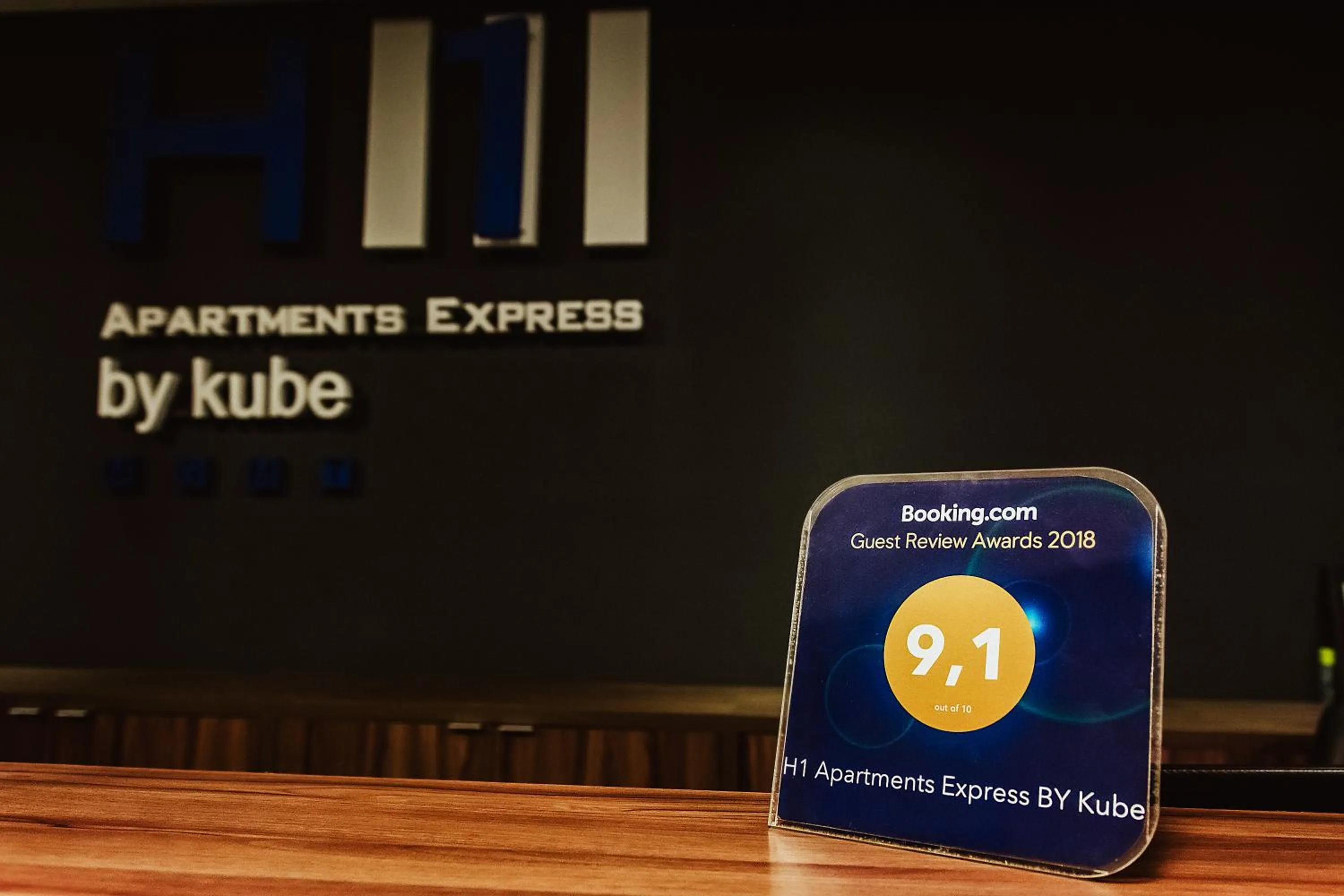 Logo/Certificate/Sign in H1 Apartments Hotel