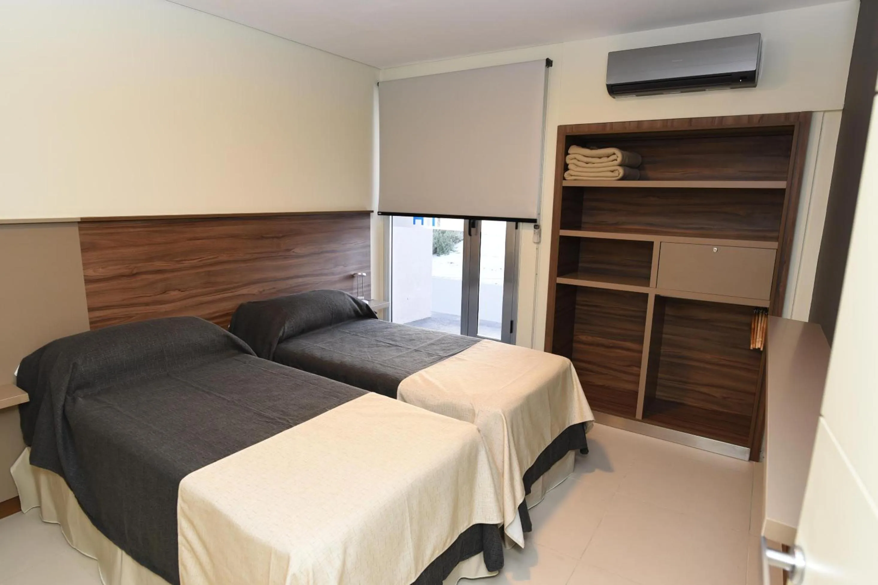 Bedroom, Bed in H1 Apartments Hotel