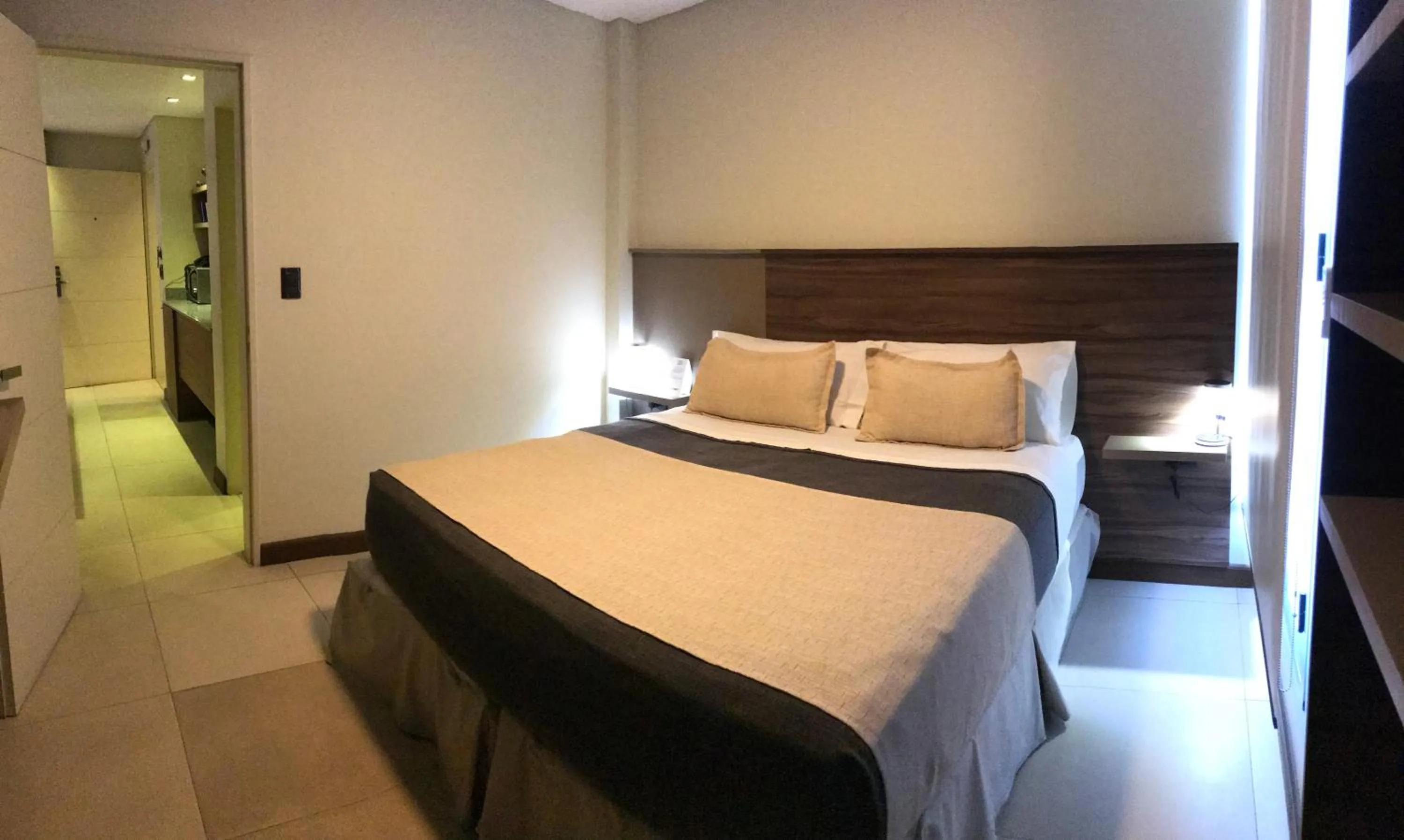 Bed in H1 Apartments Hotel