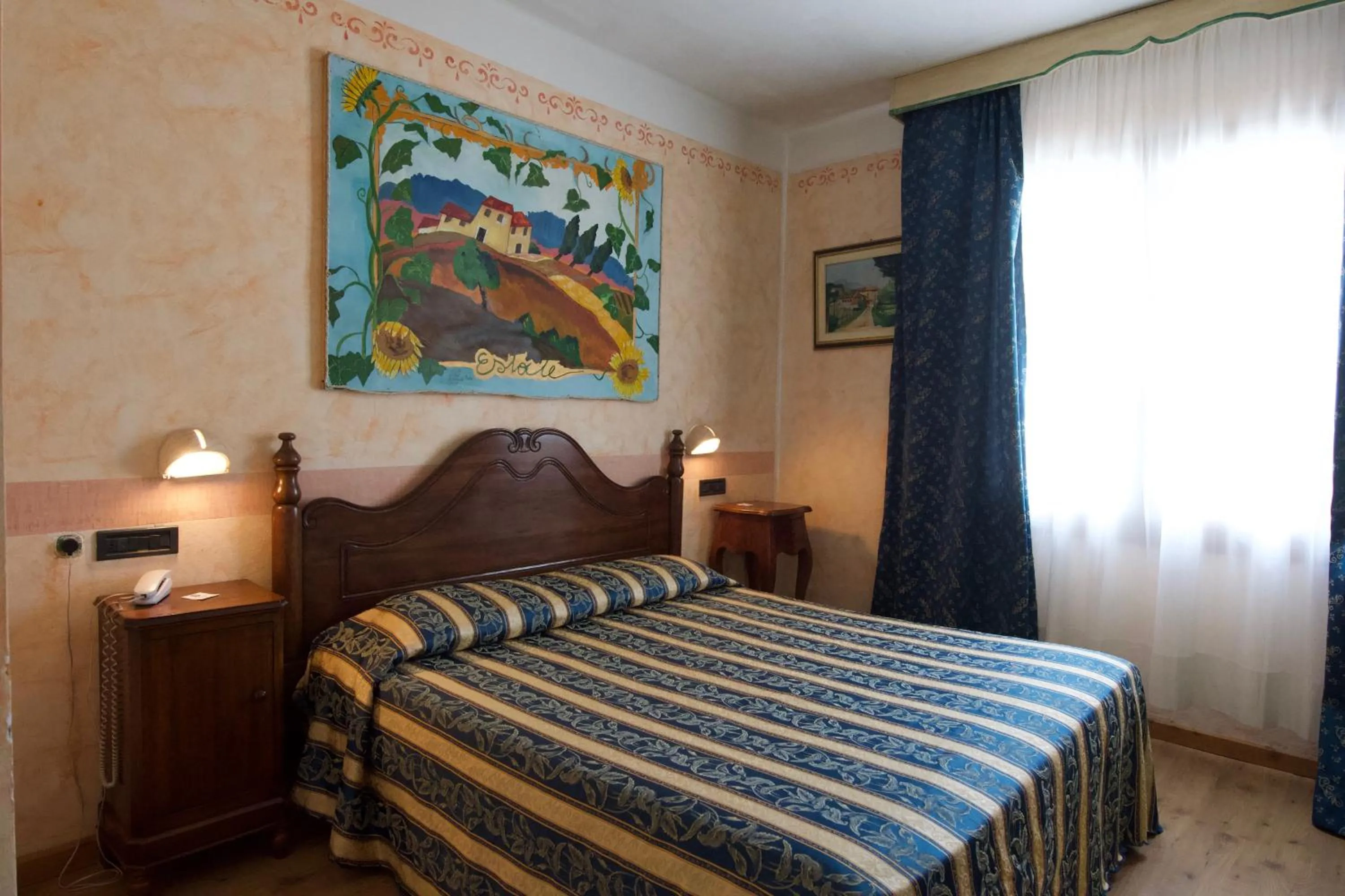 Bedroom in Locanda le Monache