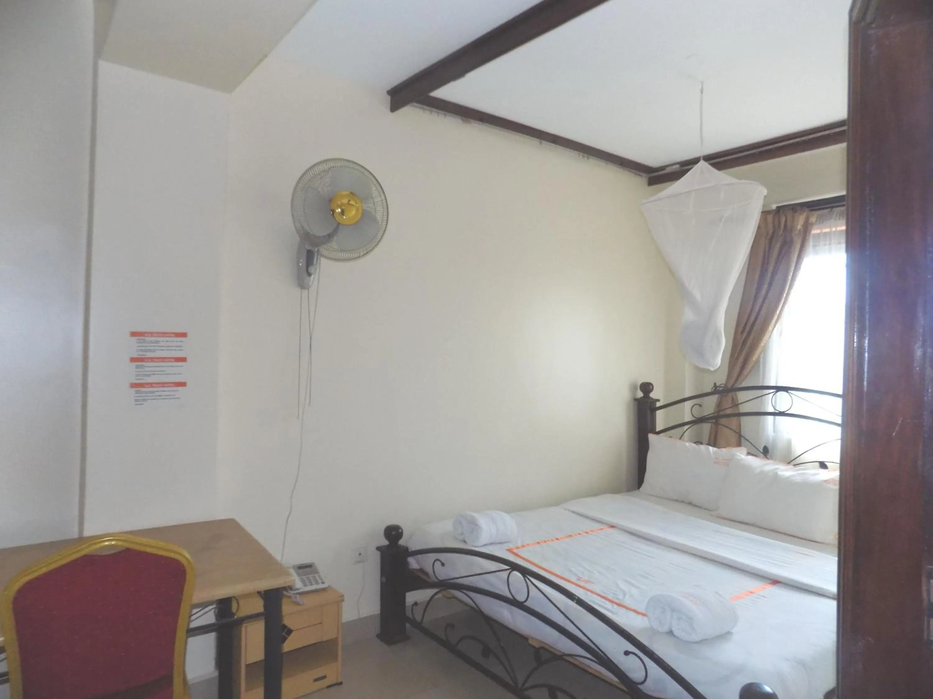 Bedroom in KK Trust Hotel Kampala