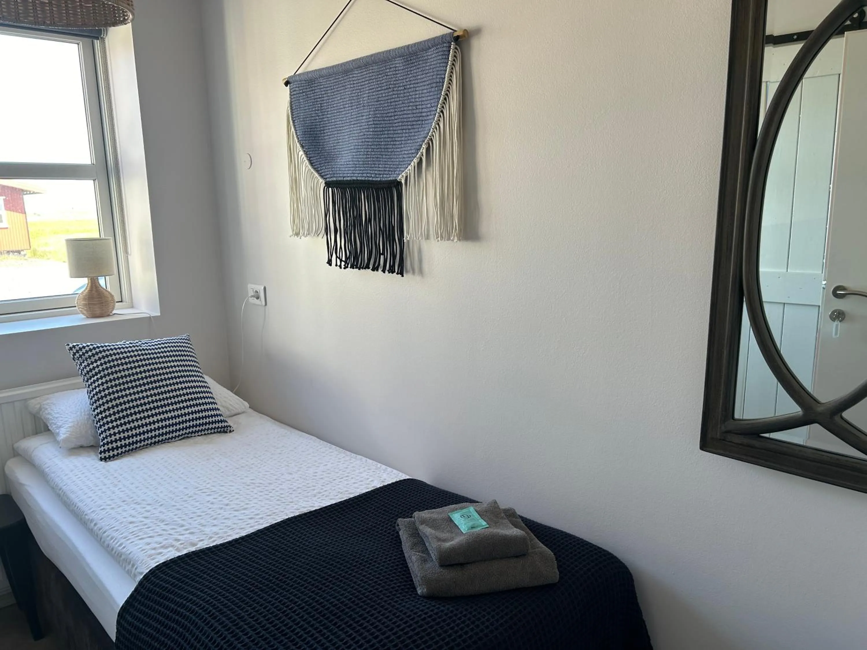 Bed in Lindartún Guesthouse