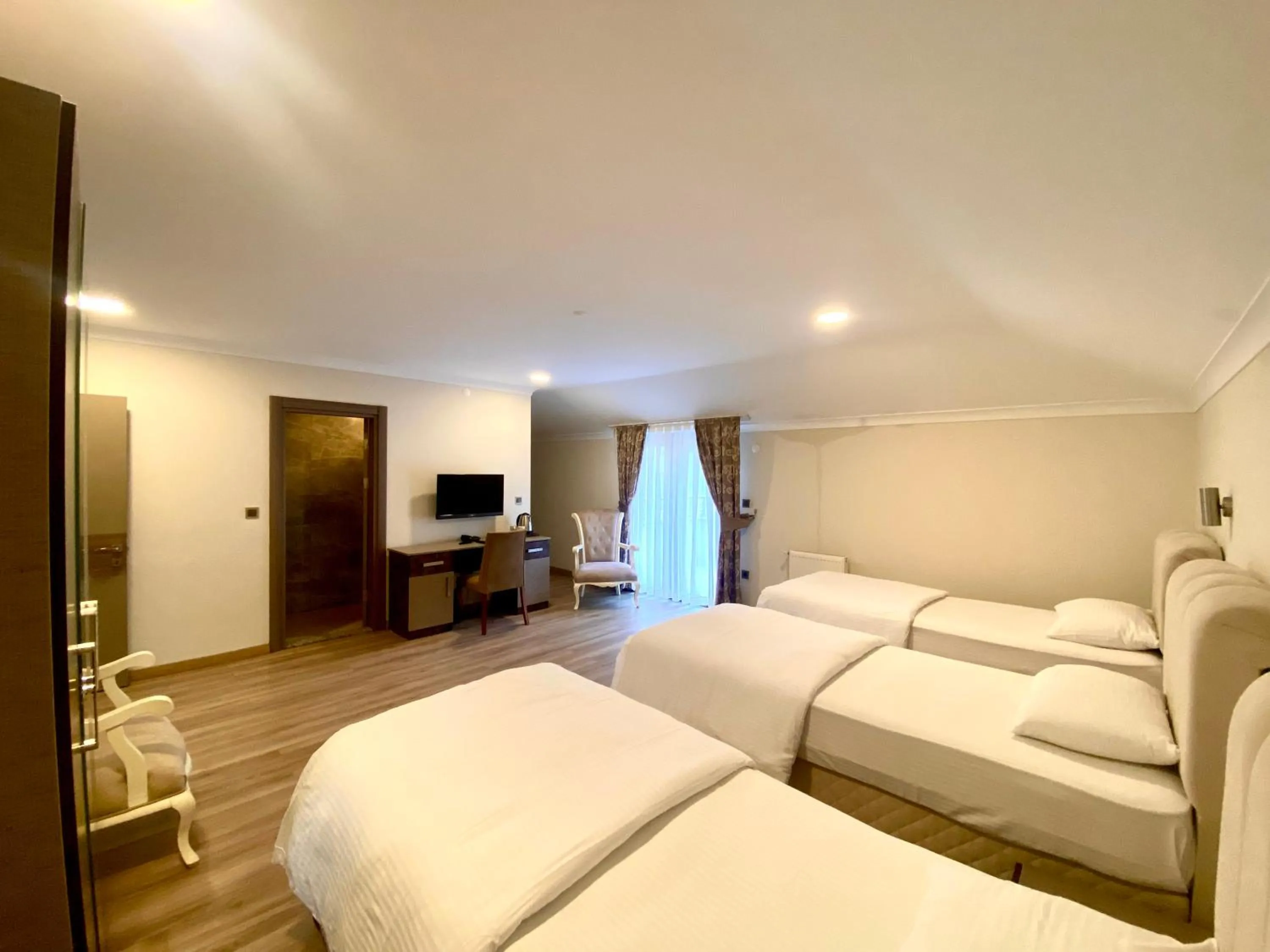 Photo of the whole room in Caykent Suites Deluxe Hotel