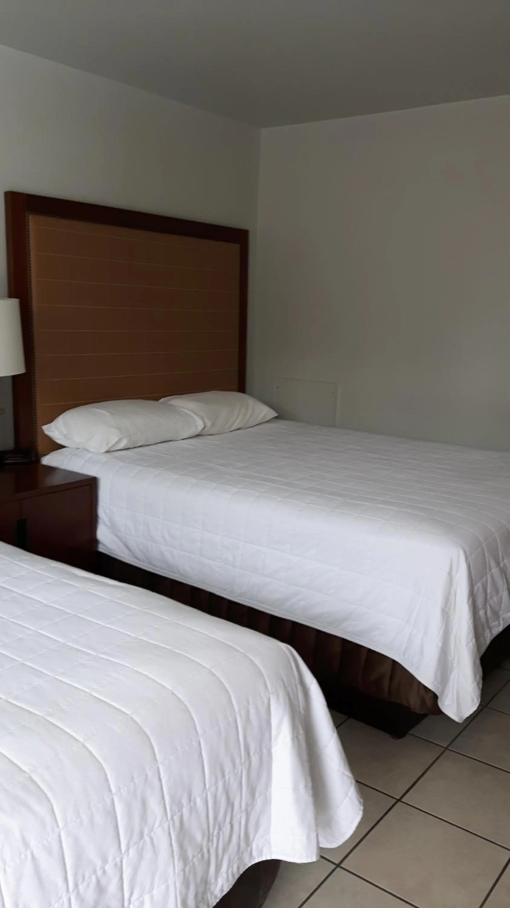 Bed in Edgewater Inn