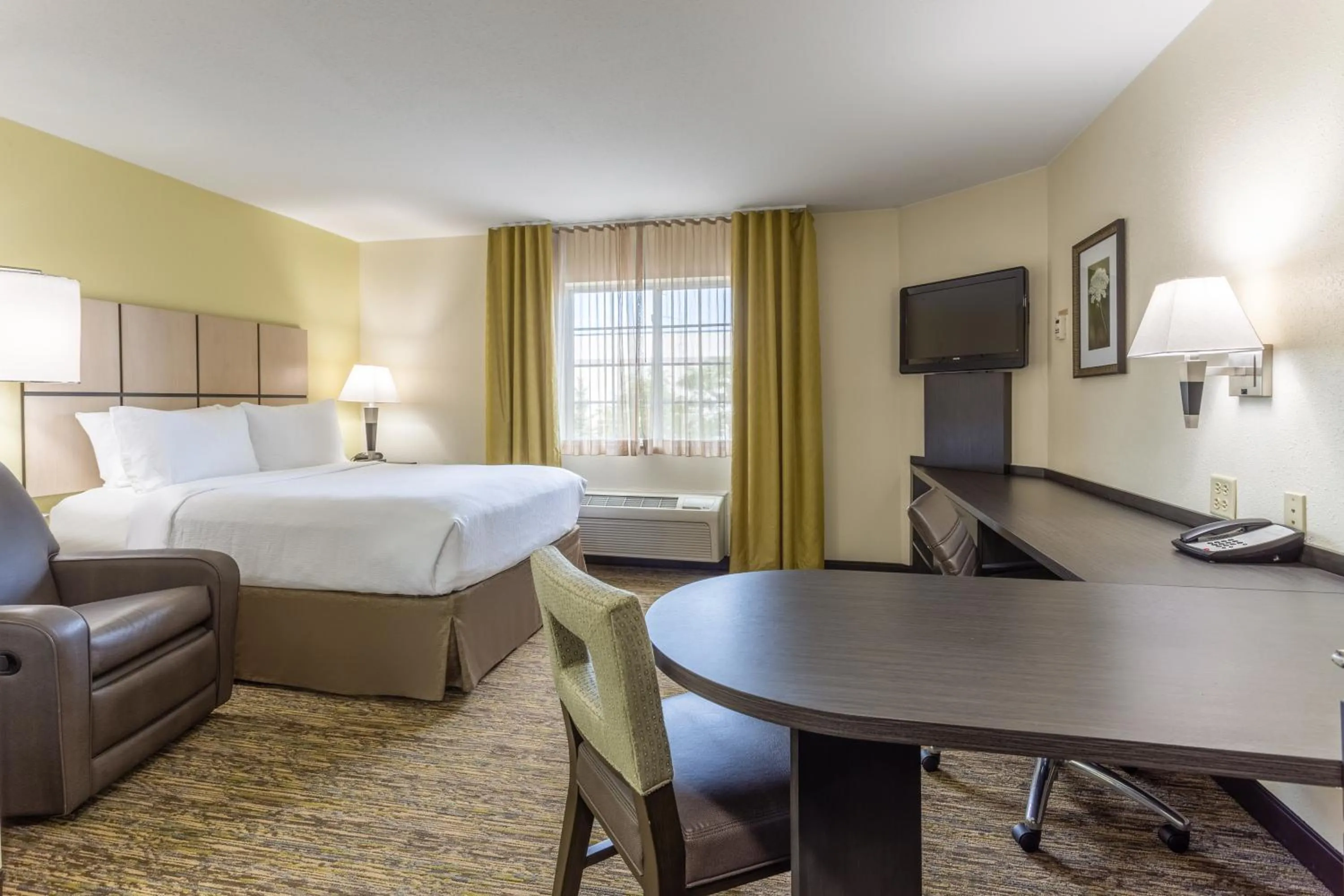Bed in Candlewood Suites Aurora-Naperville by IHG
