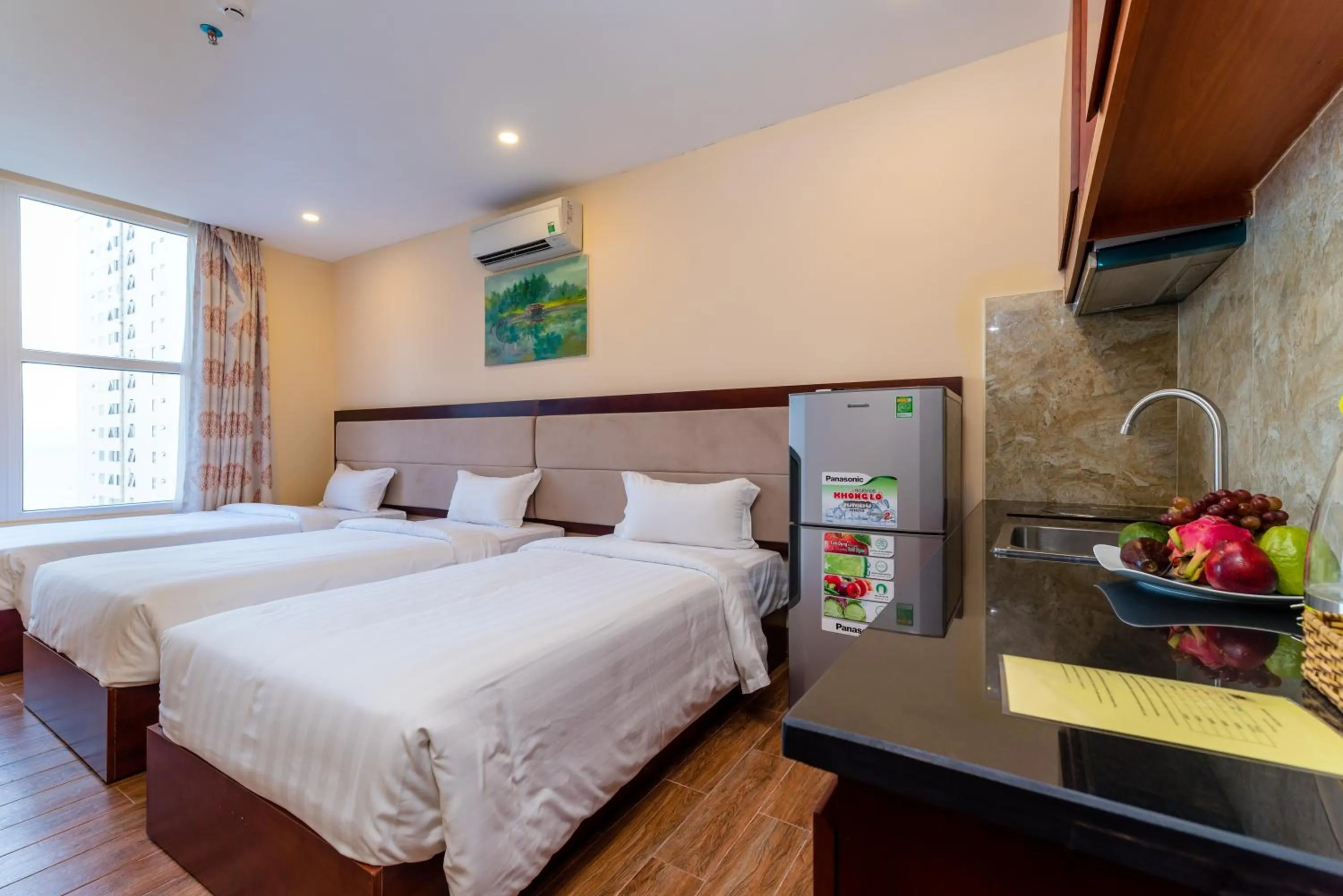 Photo of the whole room, Bed in Nhat Minh Hotel and Apartment