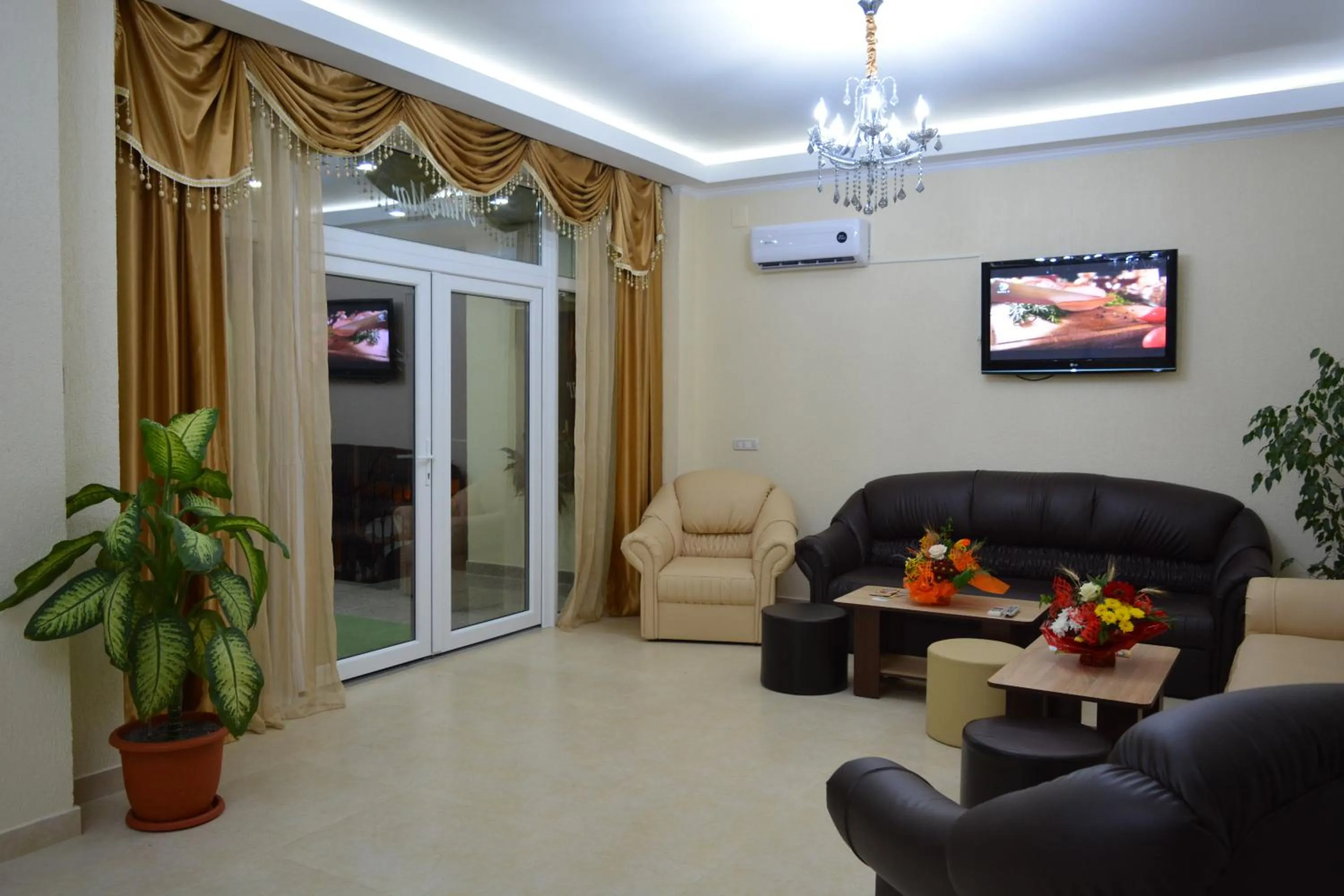 Communal lounge/ TV room in Hotel MareMar