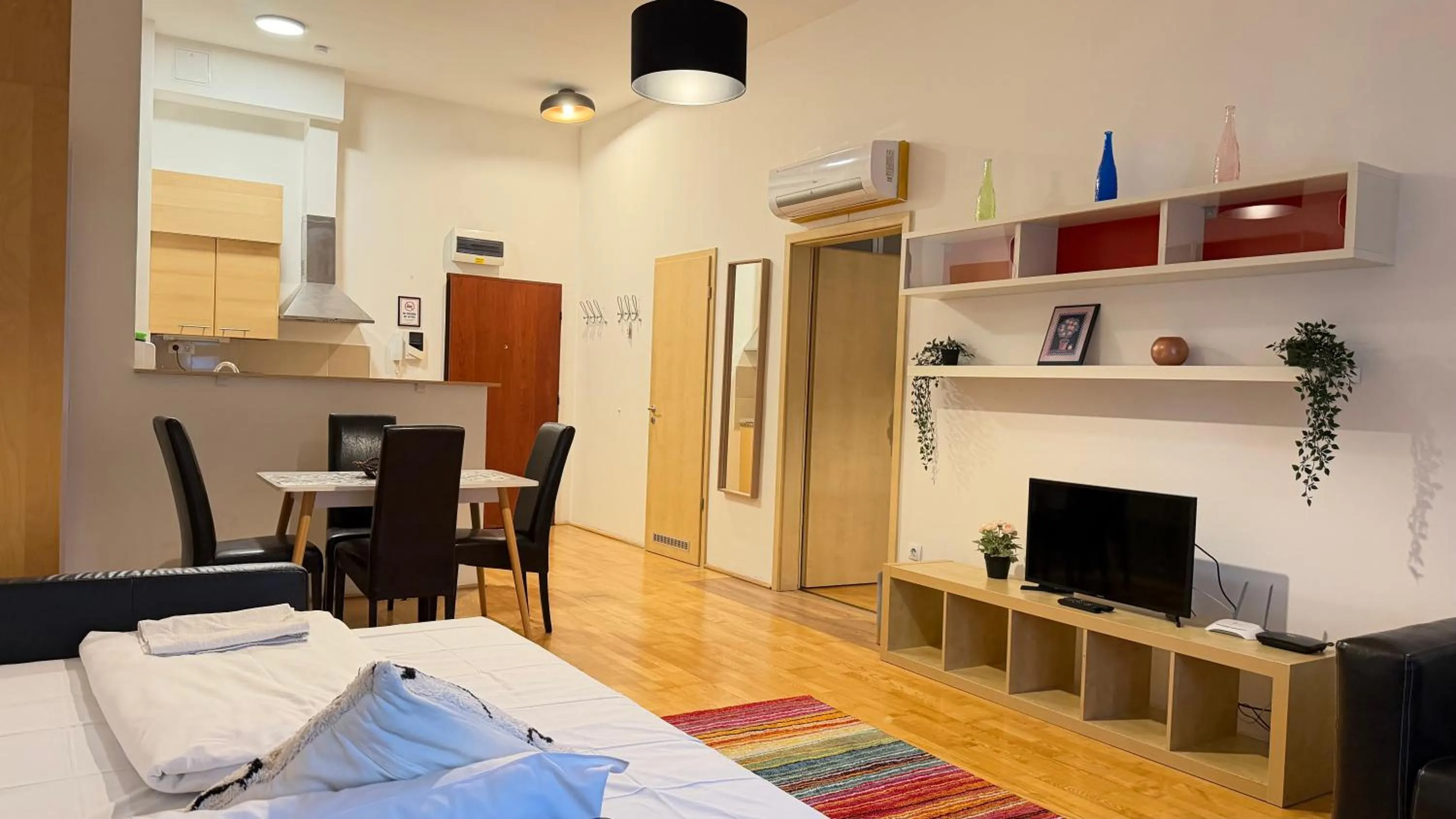 Living room, Bed in Gozsdu Court Budapest