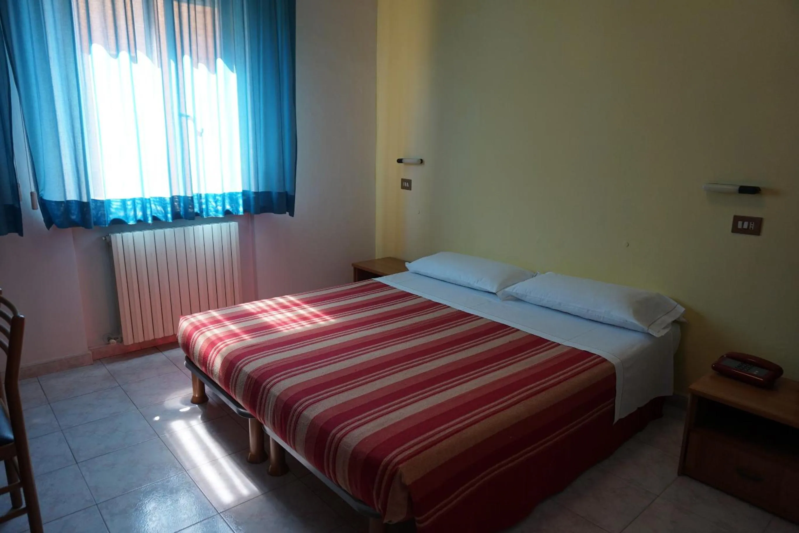 Bed in Hotel San Marco