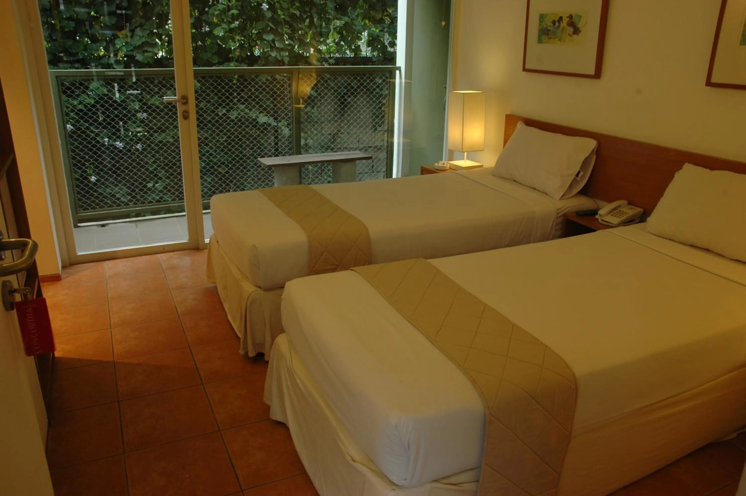 Bed in Concordia Hotel Bumi Sangkuriang Bandung