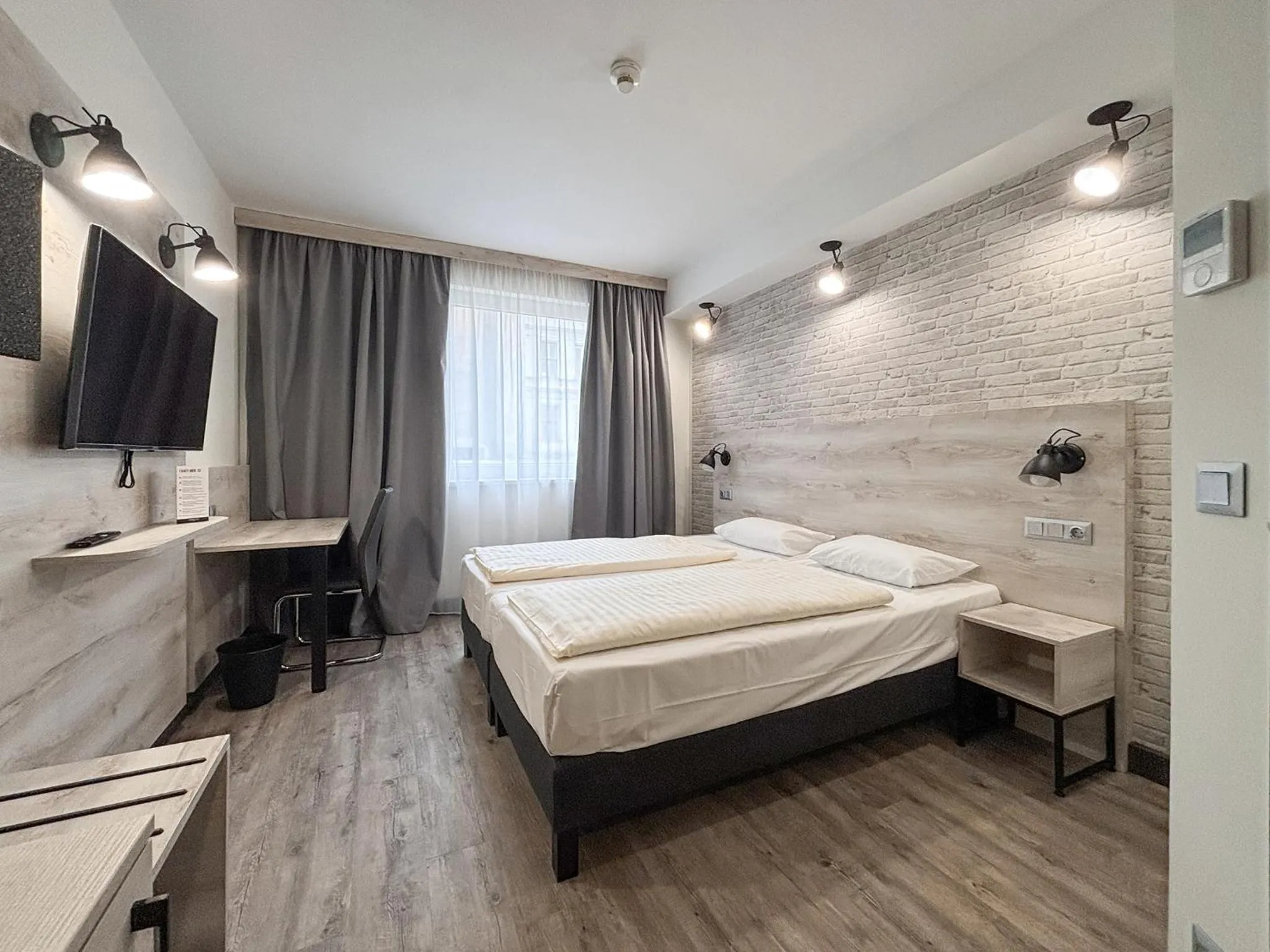 Photo of the whole room, Bed in NEXTO DORMERO Hotel Budapest